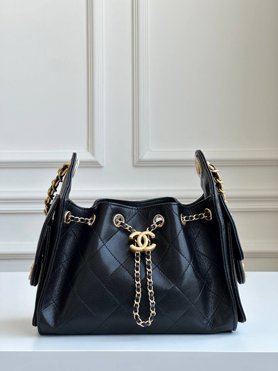 CHANEL Black Caviar Quilted Drawstring Bucket Bag with CC Logo
