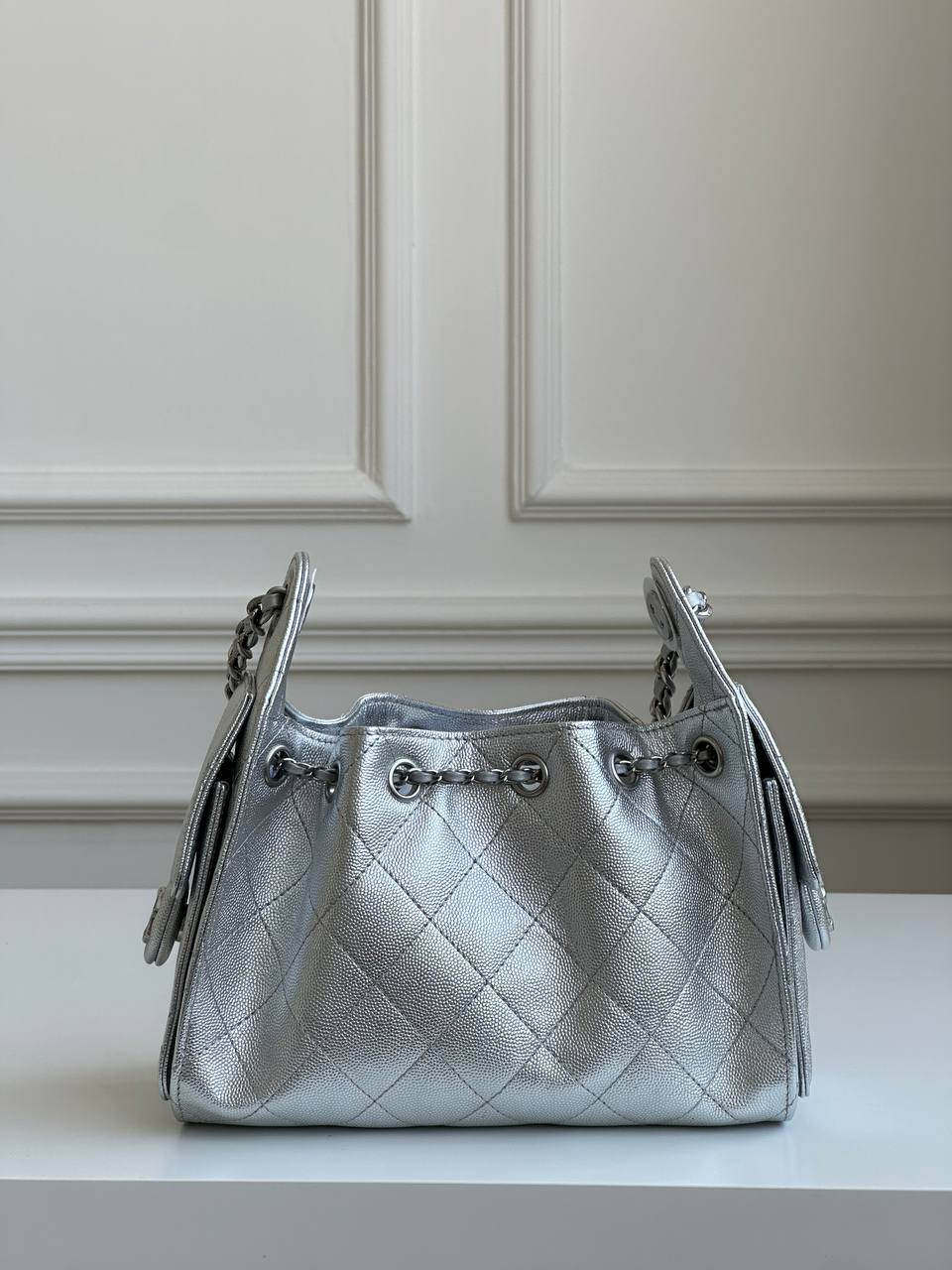 CHANEL Metallic Caviar Quilted Drawstring Bucket Bag