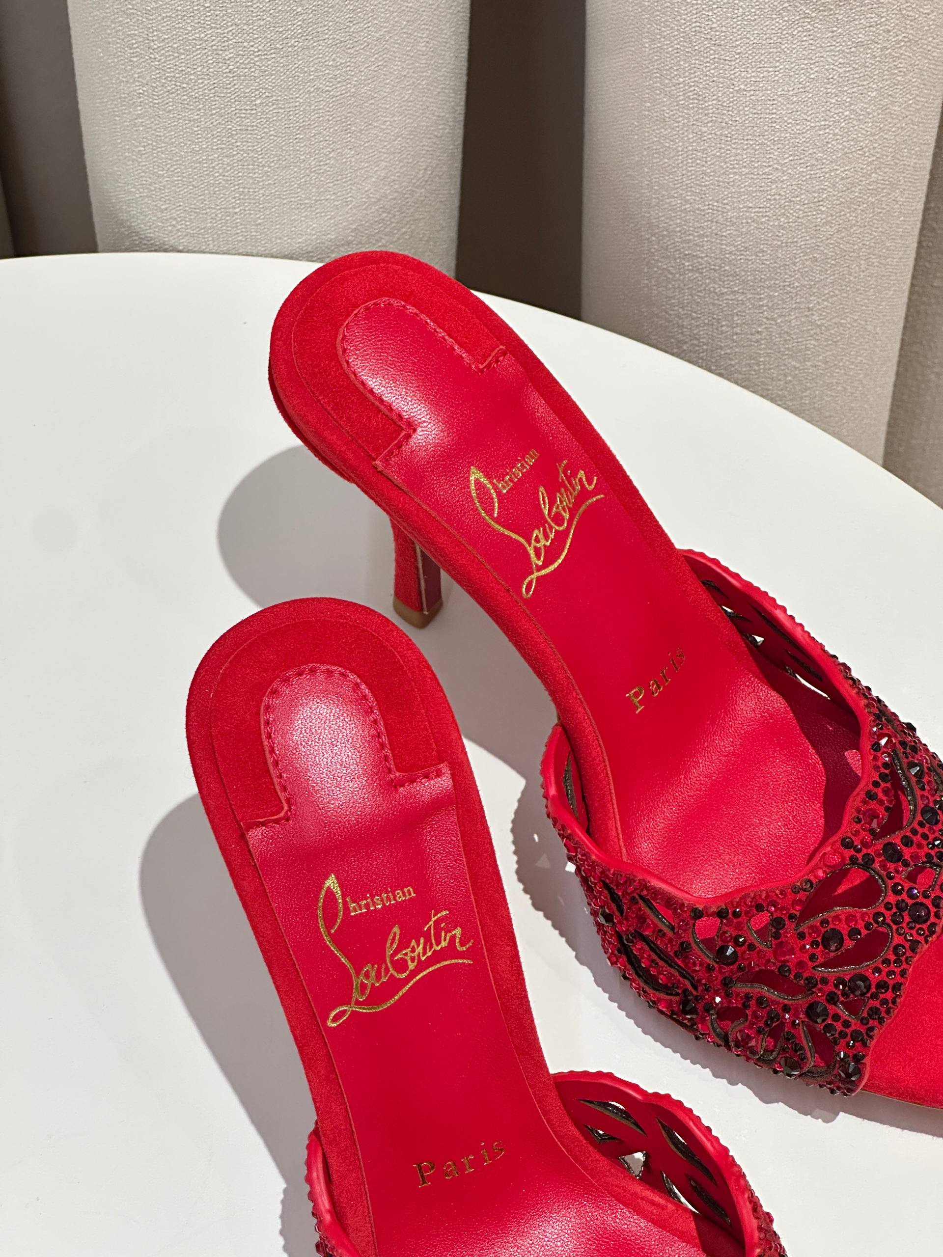 Christian Louboutin  Red-soled rhinestone mules