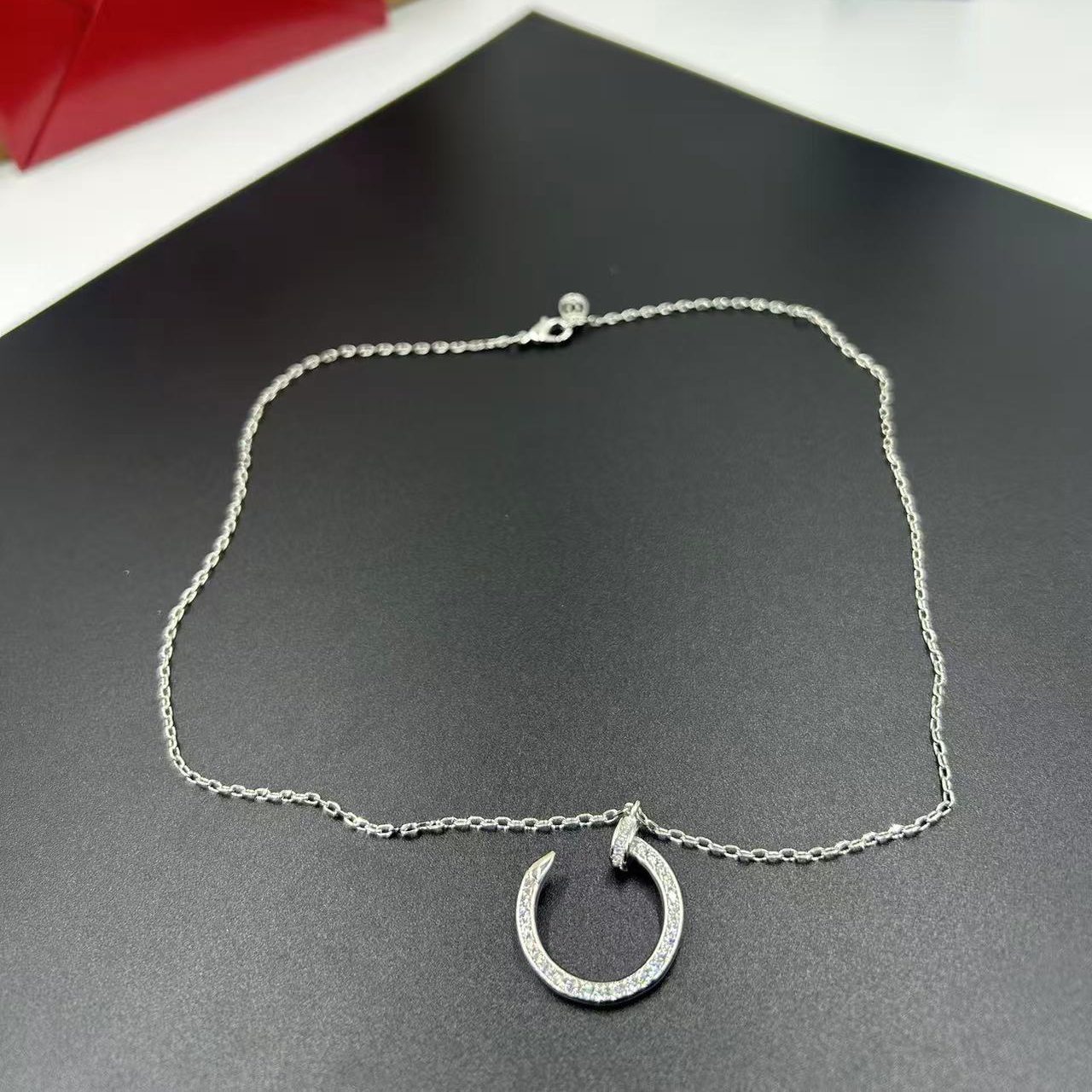 CARTIER C-SHAPED DIAMOND NECKLACE