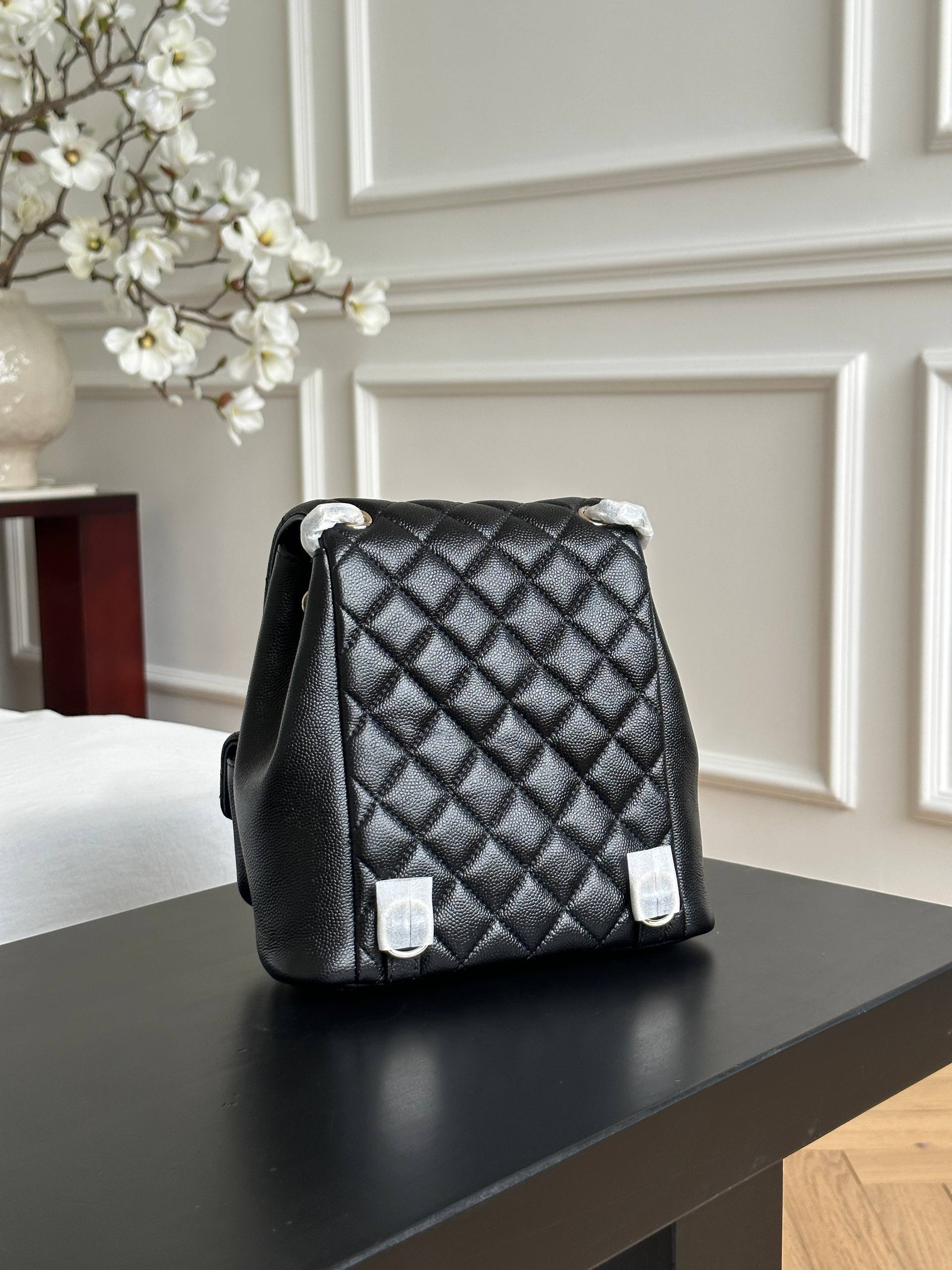 Chanel Black Caviar Quilted Double Pocket CC Drawstring Chain Mini Backpack
