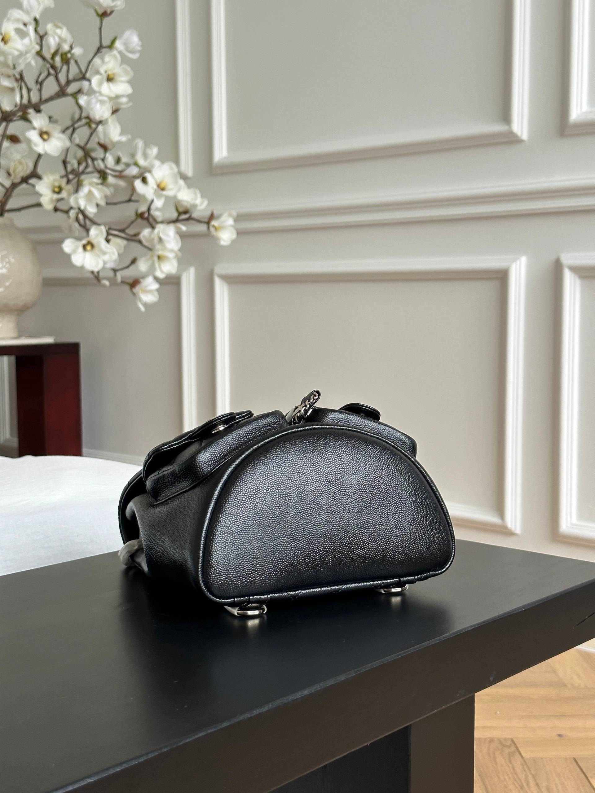 Chanel Black Caviar Quilted Double Pocket CC Drawstring Chain Mini Backpack