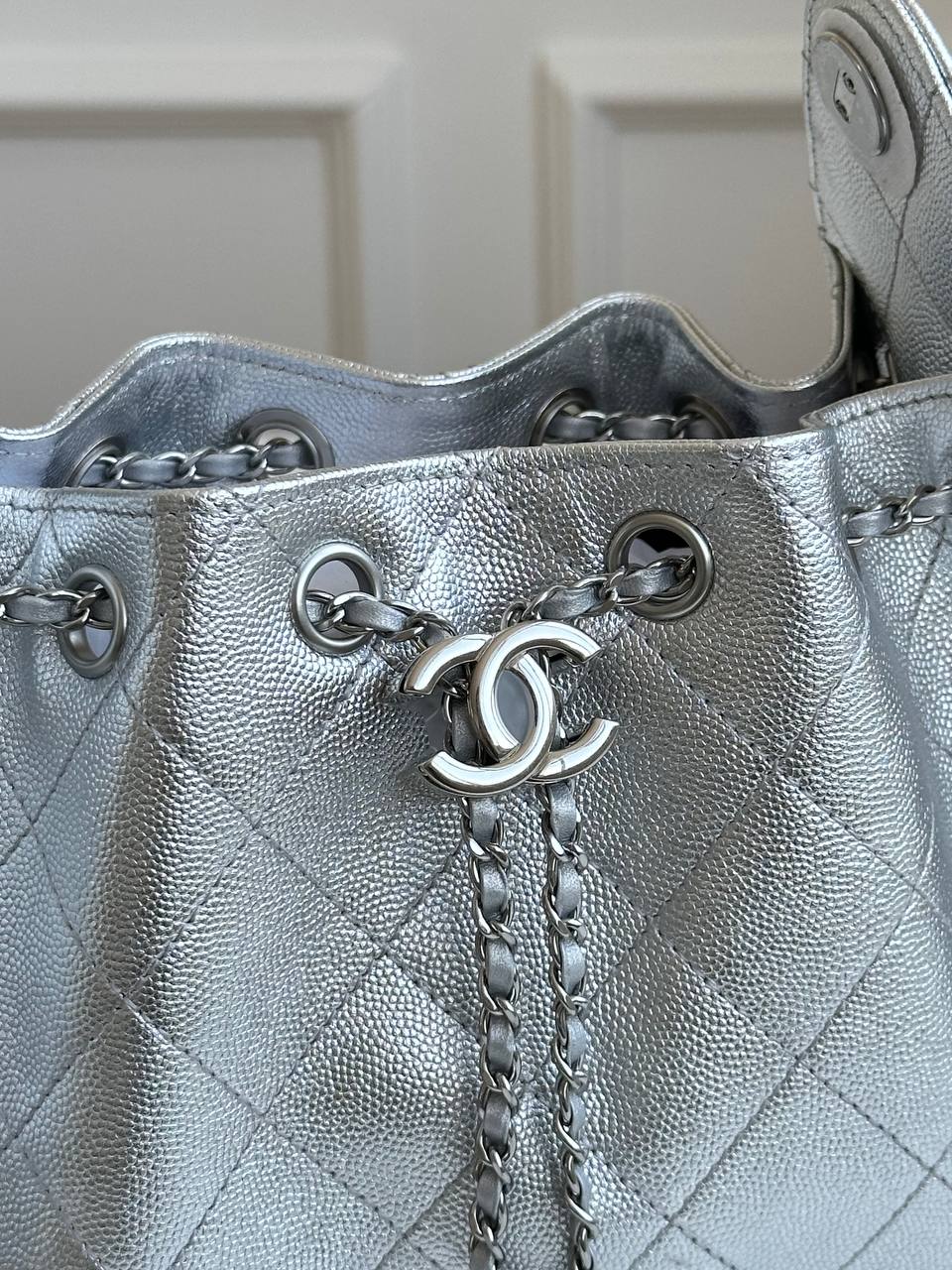 CHANEL Metallic Caviar Quilted Drawstring Bucket Bag