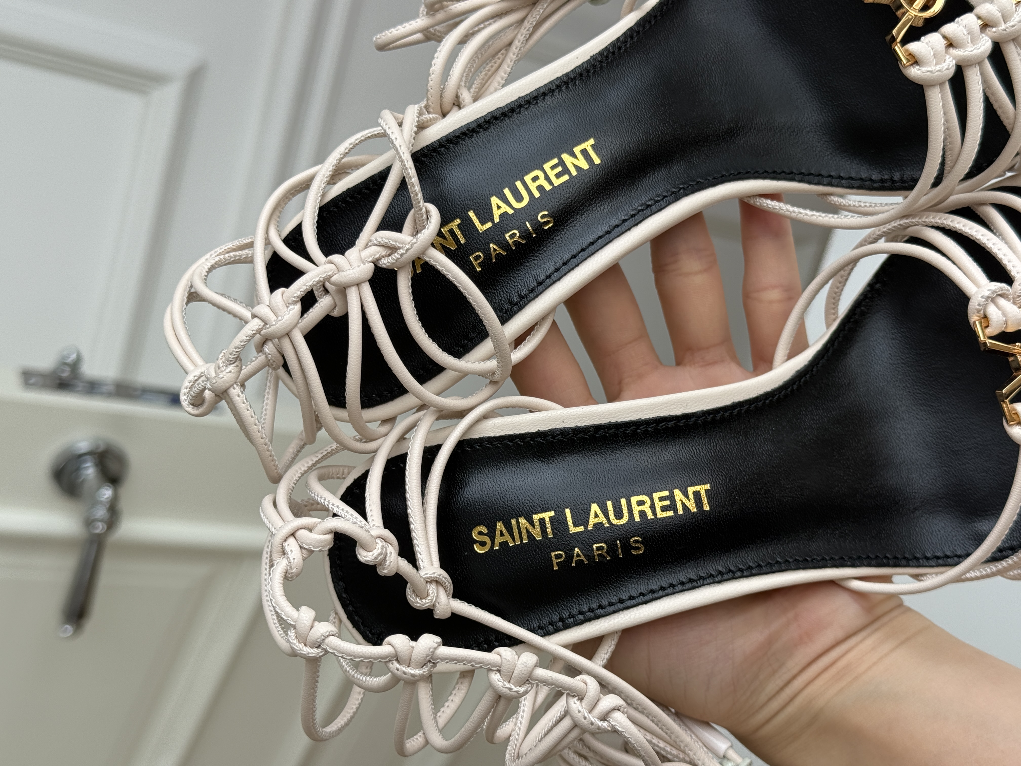 Saint Laurent Off-White Knotted Strappy Stiletto Heel Sandals with YSL Logo