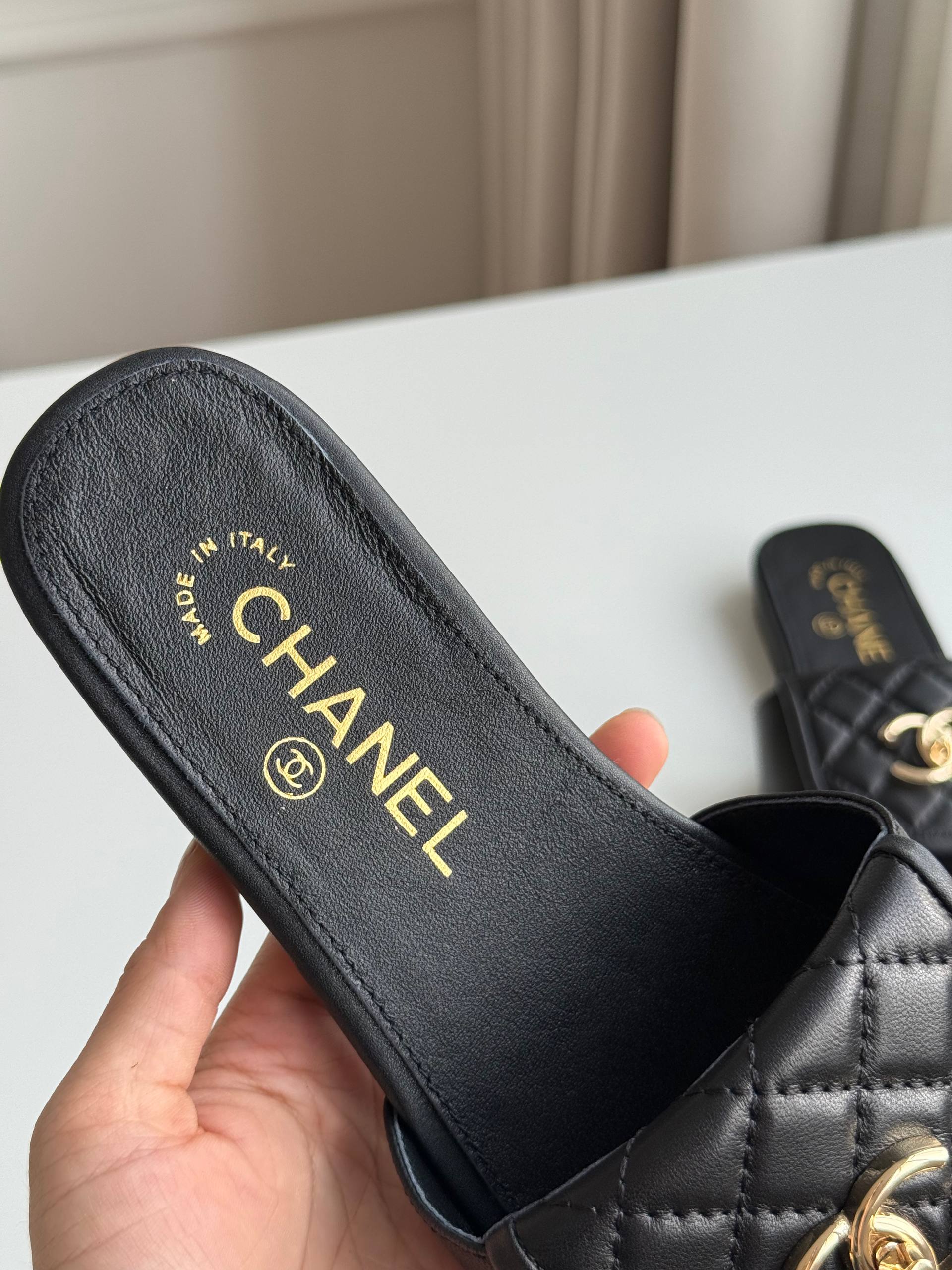 CHANEL QUILTED CC TURNLOCK FLAT MULES