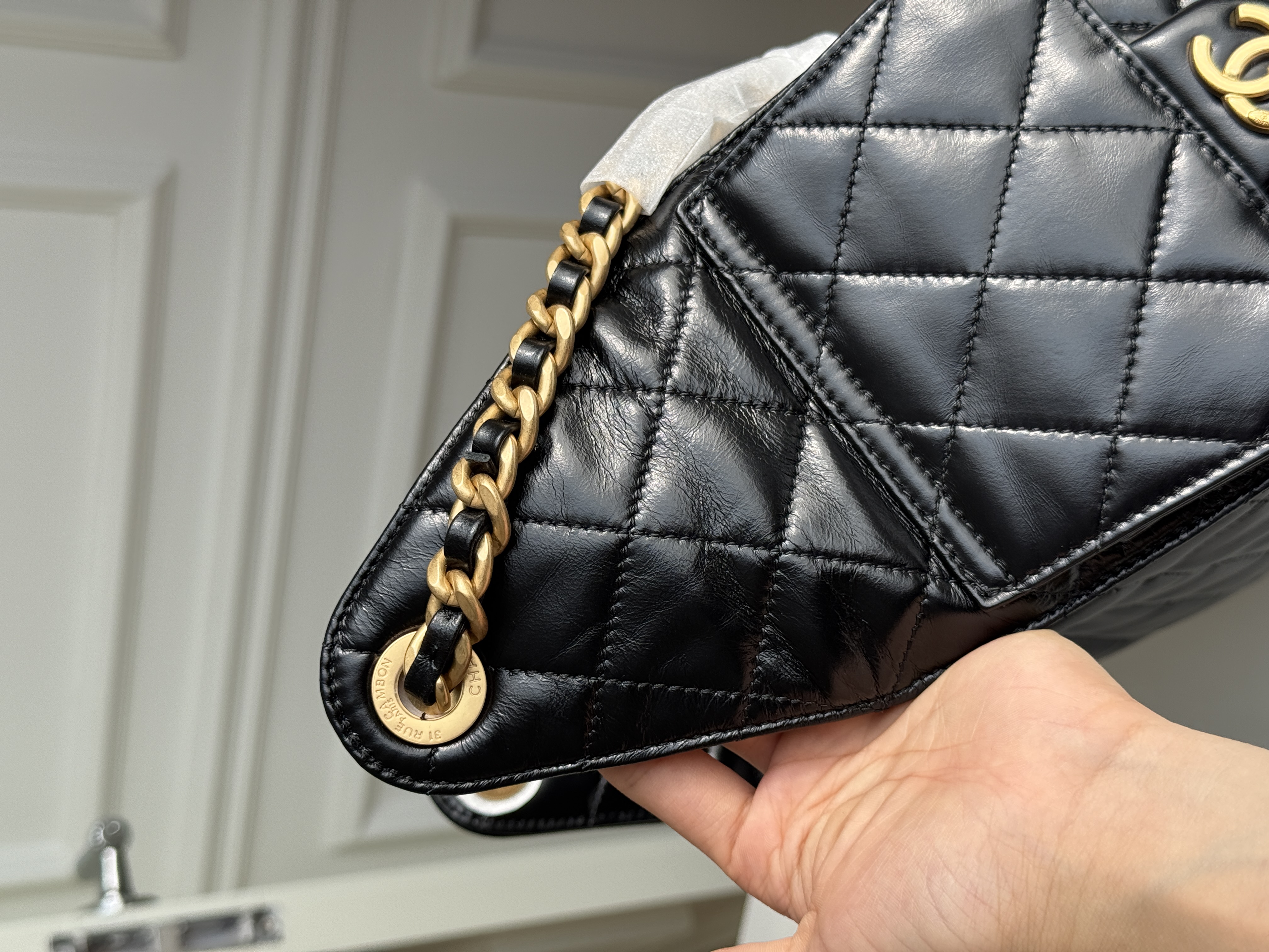 Chanel 25C Black Gold Waxed Leather Drawstring Hobo Bag
