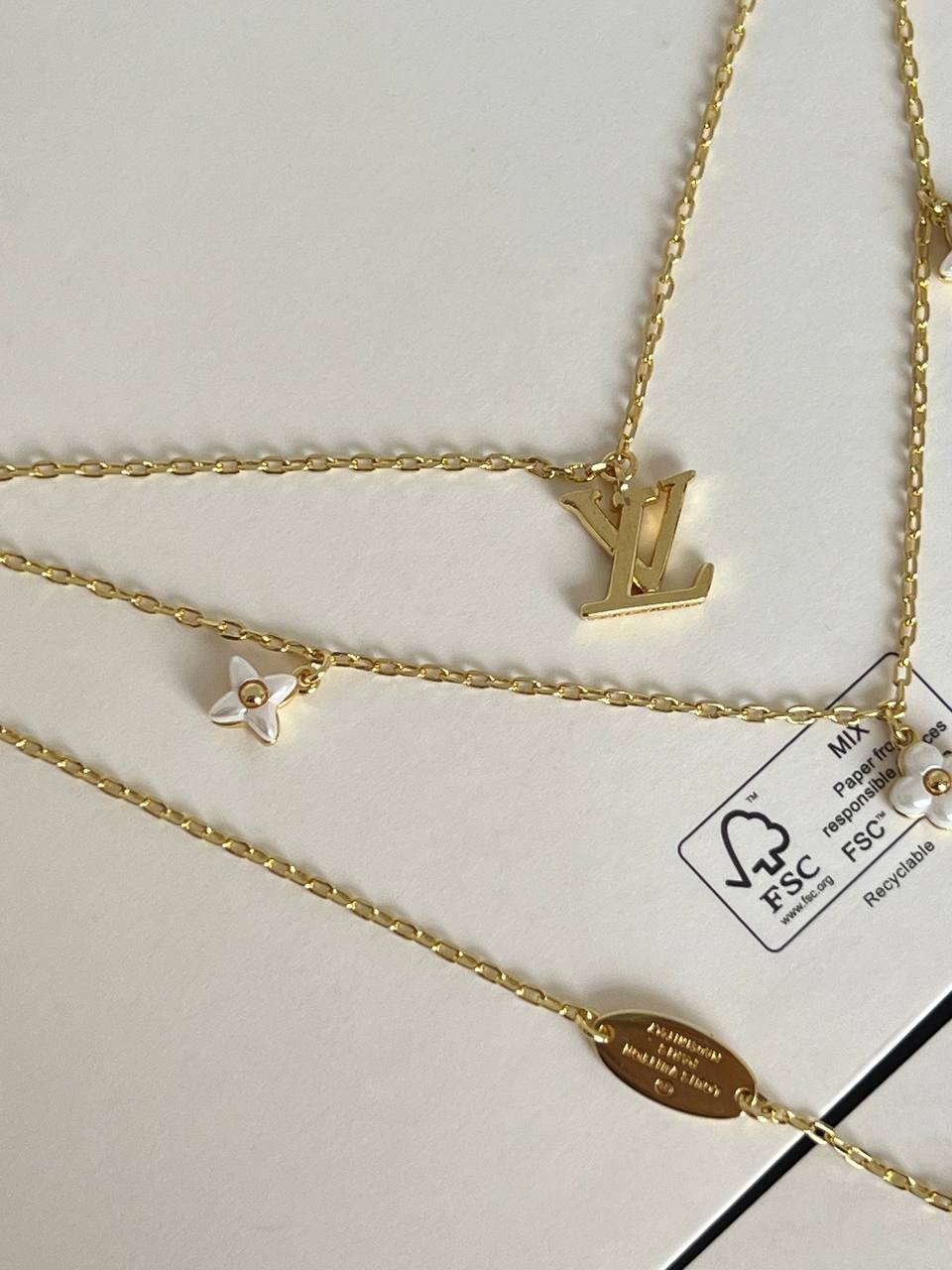 Louis Vuitton Gold Metal Triple Layer Necklace Set With LV Logo, Clover Charms & Pearl Pendant