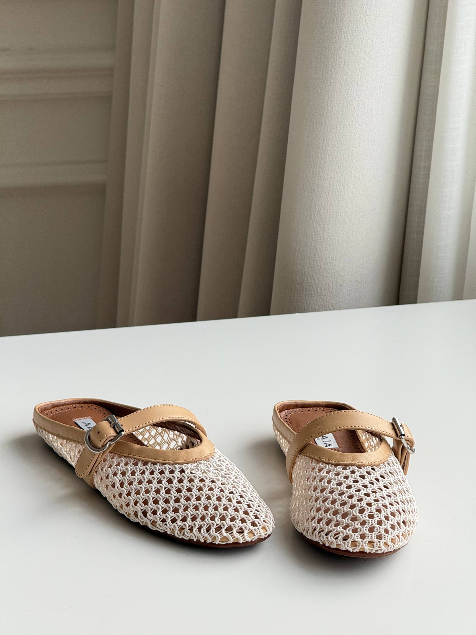 Alaïa Hollow-out Woven Mary Jane Flat Mule Shoes