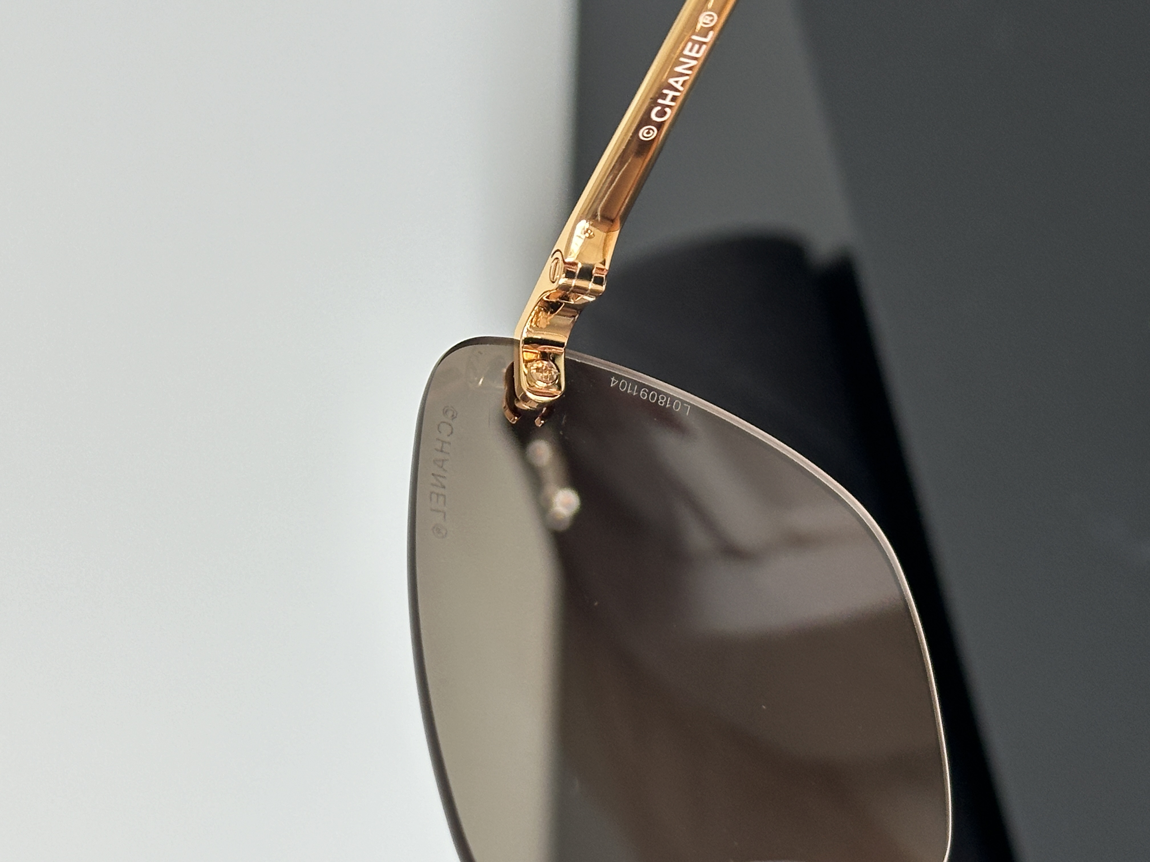 CHANEL Rimless Metal CC Cut Gradient Brown Sunglasses