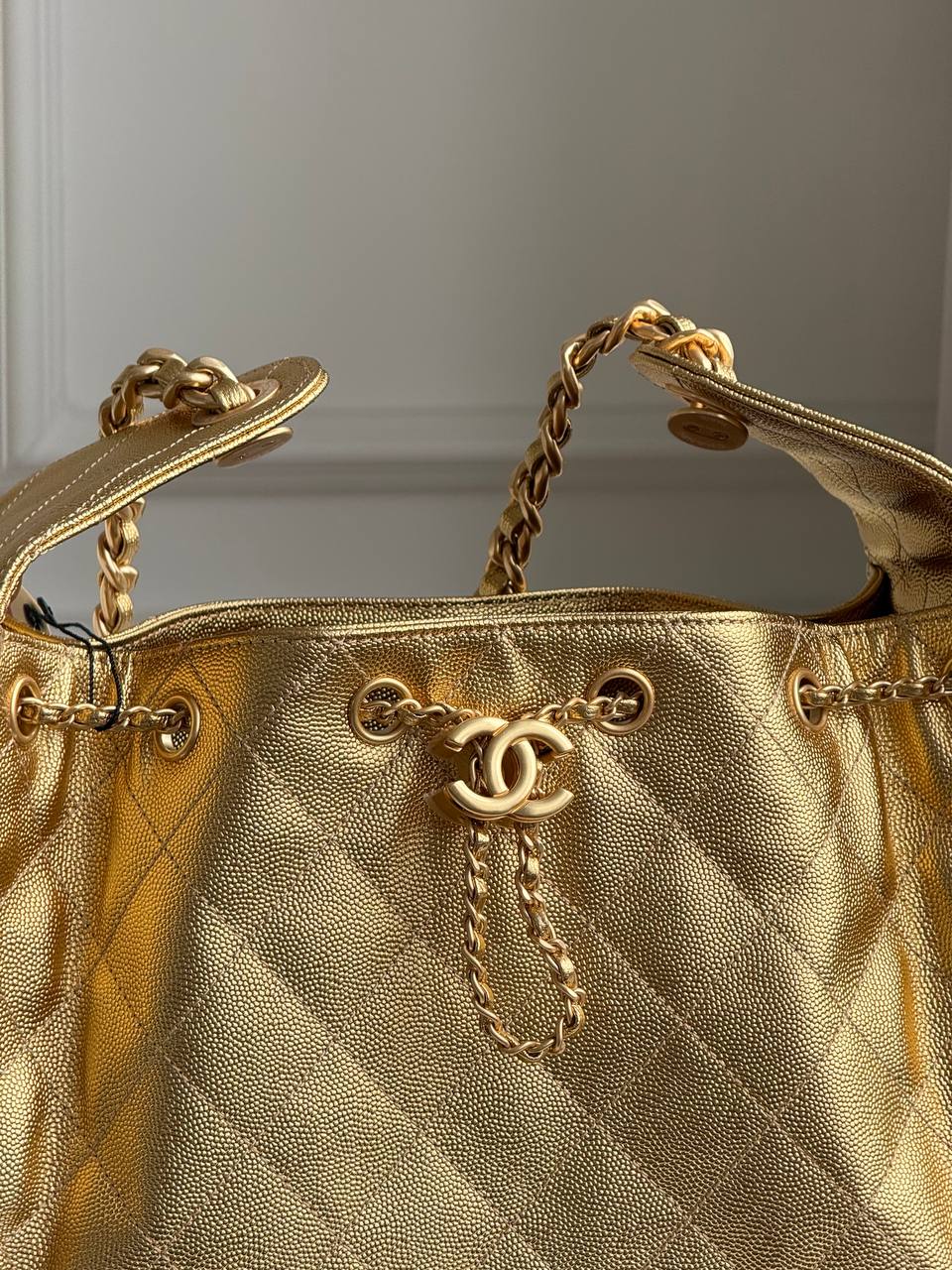 Chanel 25 Mini/Small Metallic Grained Calfskin Bucket Bag in Gold
