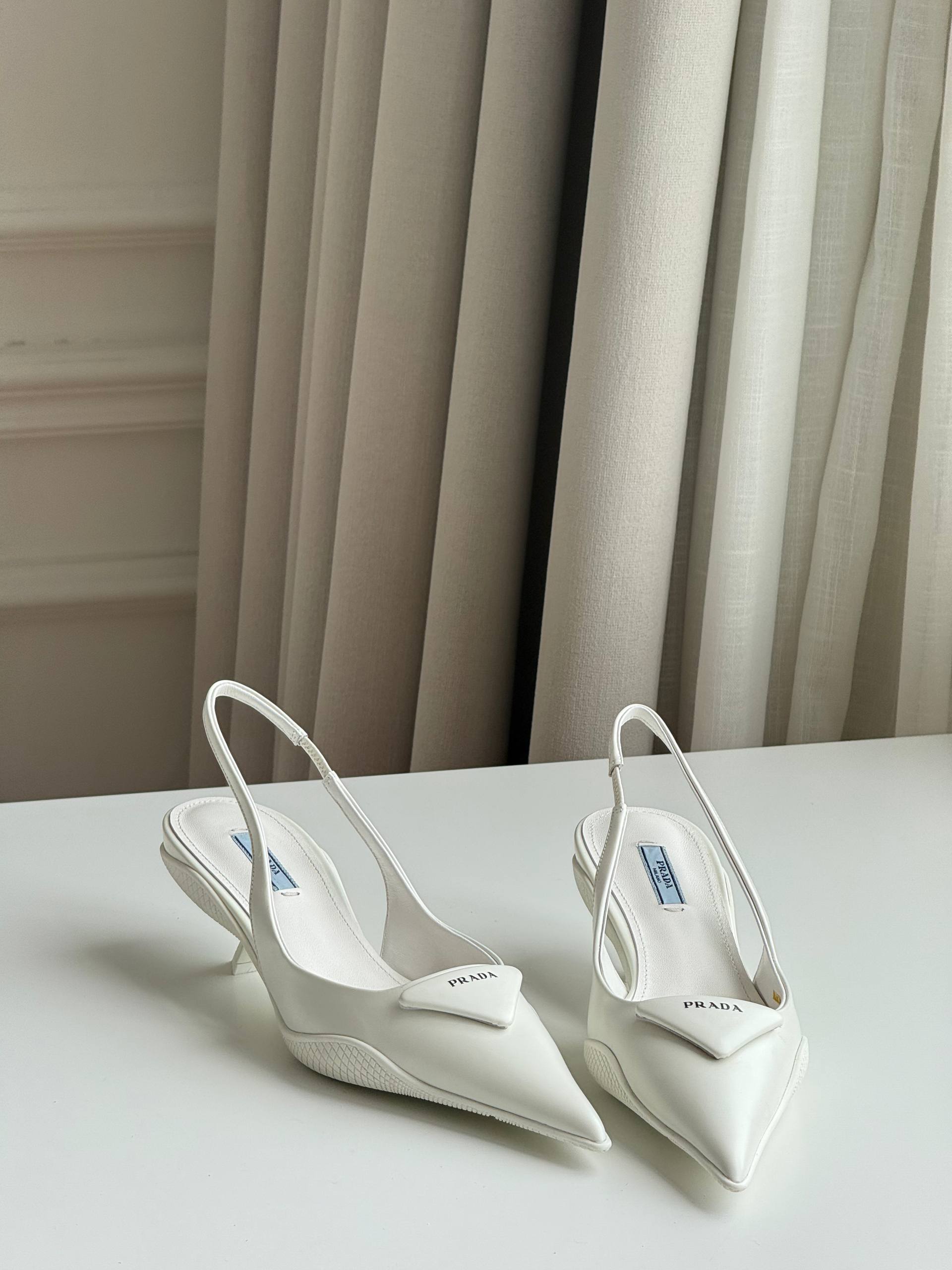 Prada Triangle Logo Slingback Pointed-Toe Kitten Heel Pumps