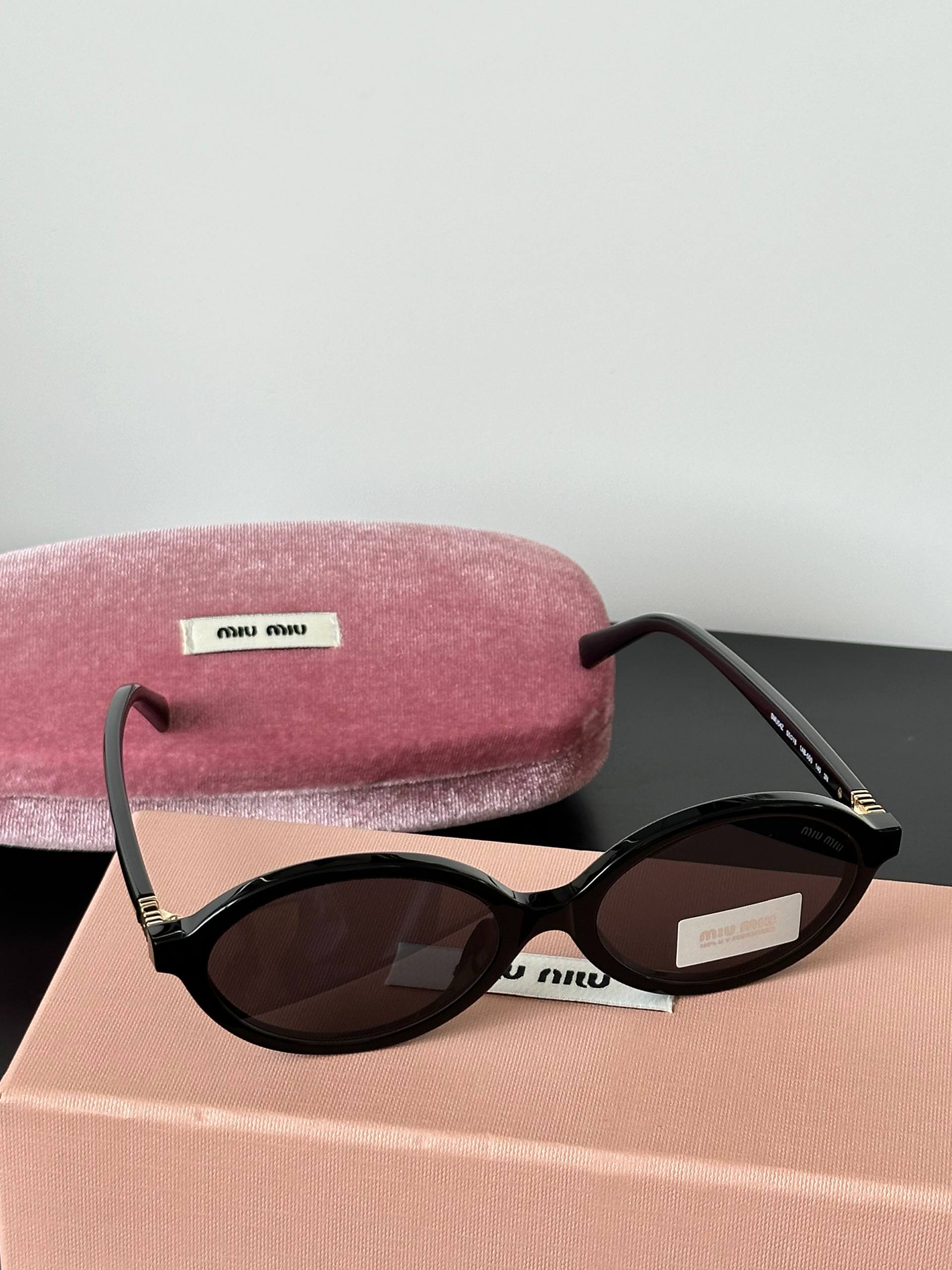 Miu Miu Vintage Oval Black Frame Sunglasses