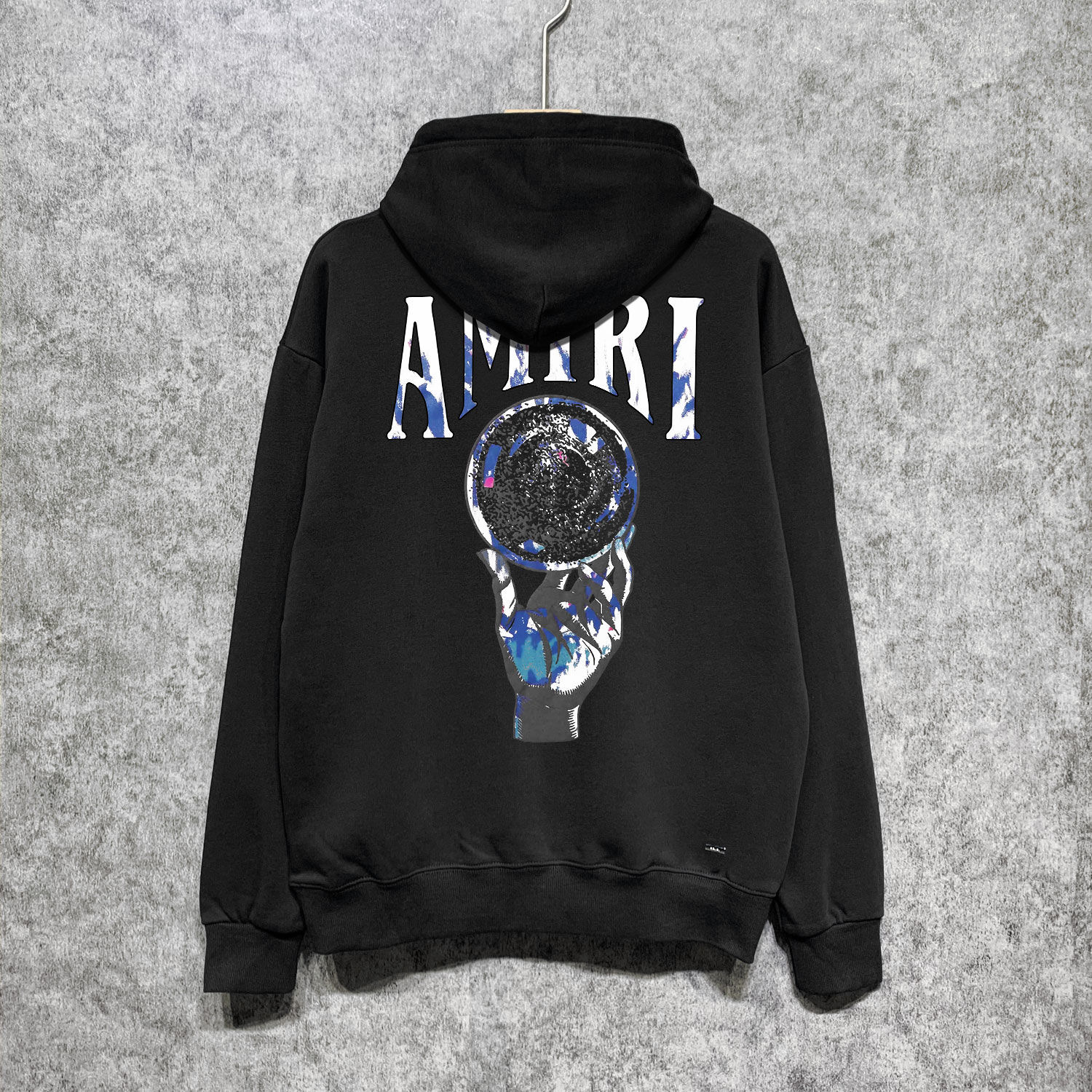 hand on ball hoodie