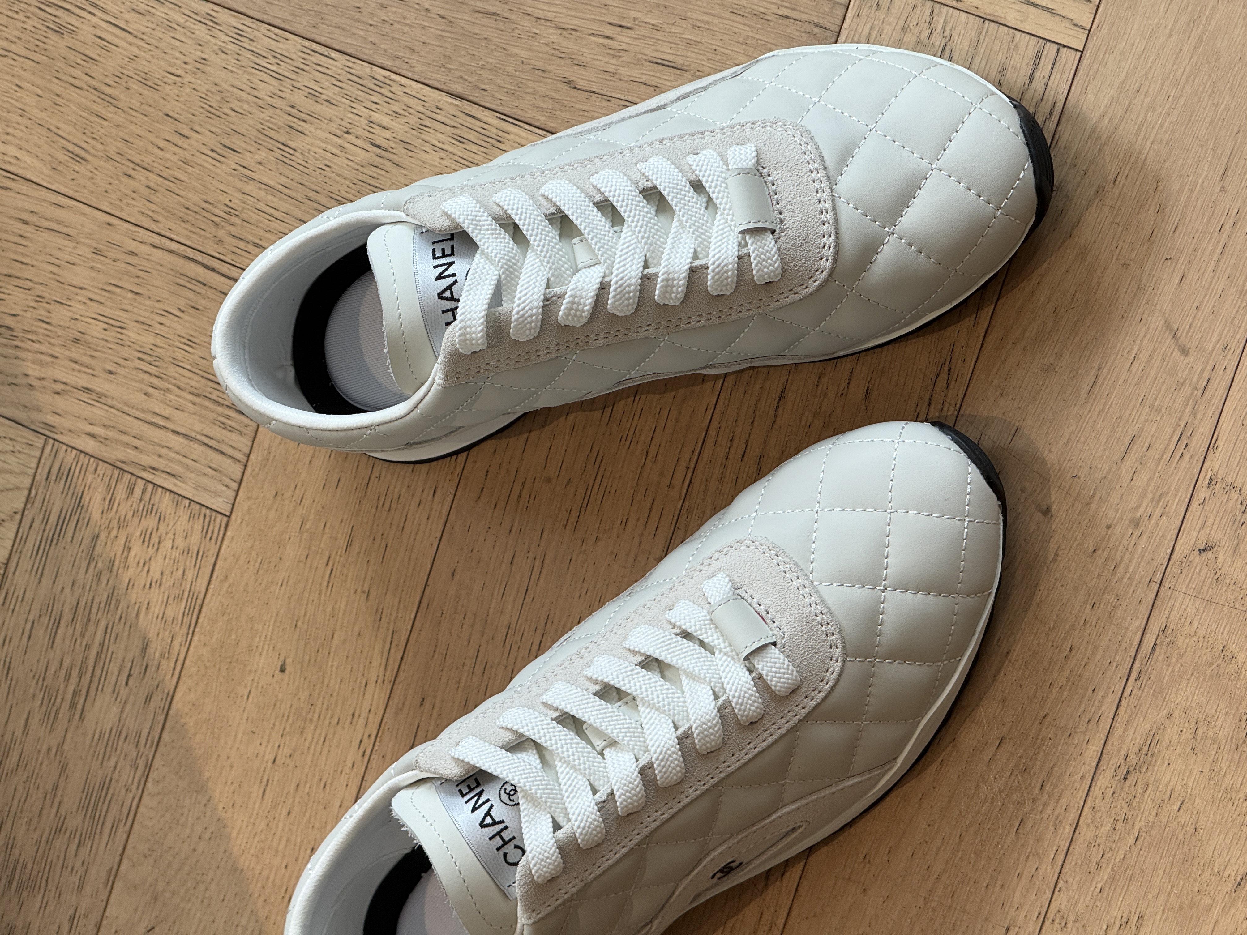 CHANEL Lambskin Quilted German Trainer Sneakers