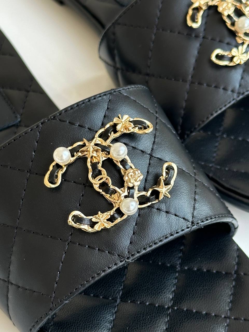 Chanel Black Quilted Lambskin Pearl Chain CC Logo Flat Slide Sandals