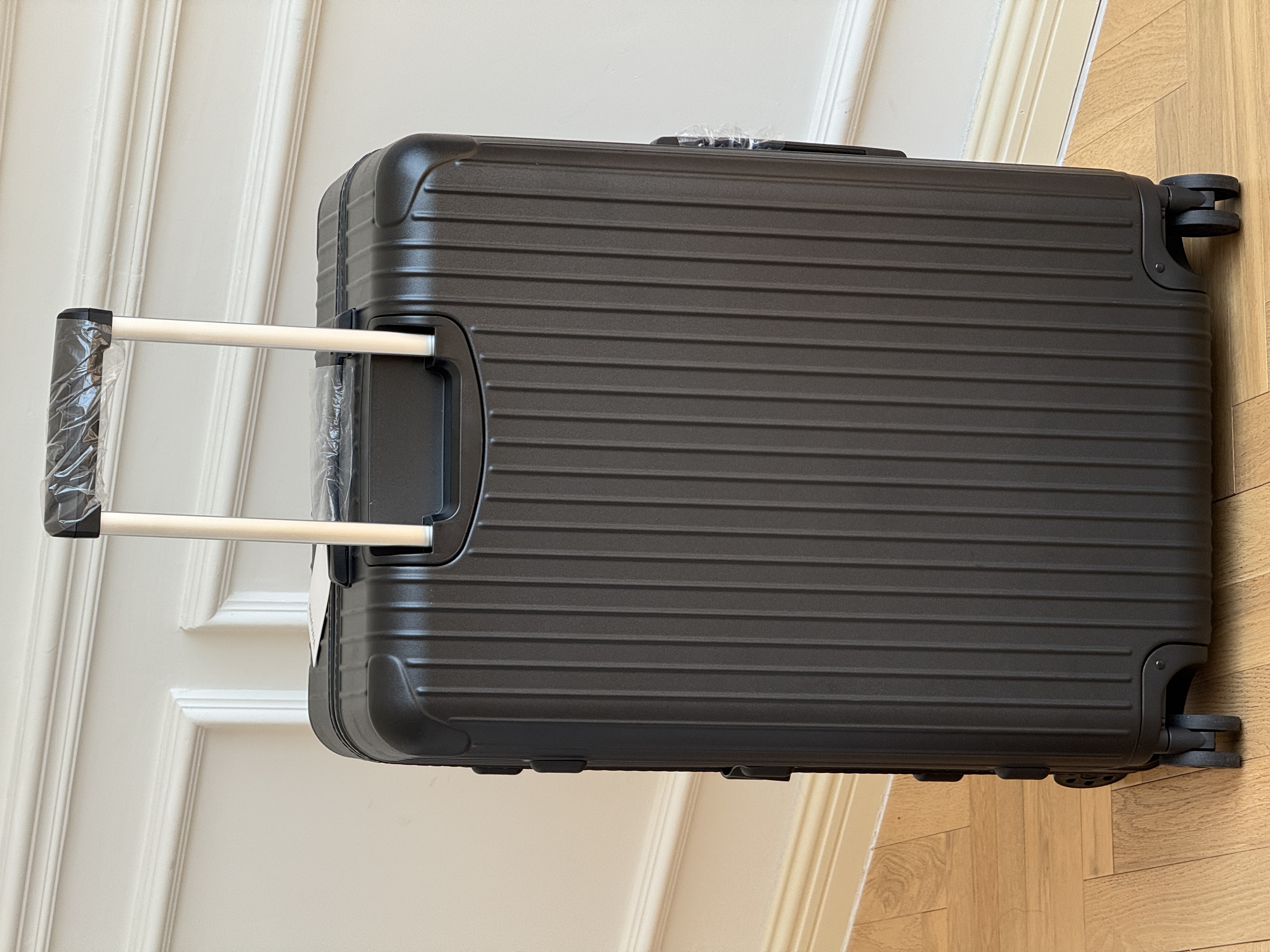 RIMOWA Essential Matte Black Vertical Groove Check-in Luggage