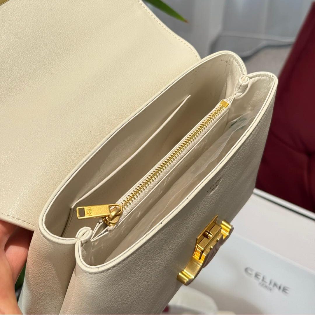 MEDIUM BUCKET IN TRIOMPHE CANVAS ANDCALFSKIN