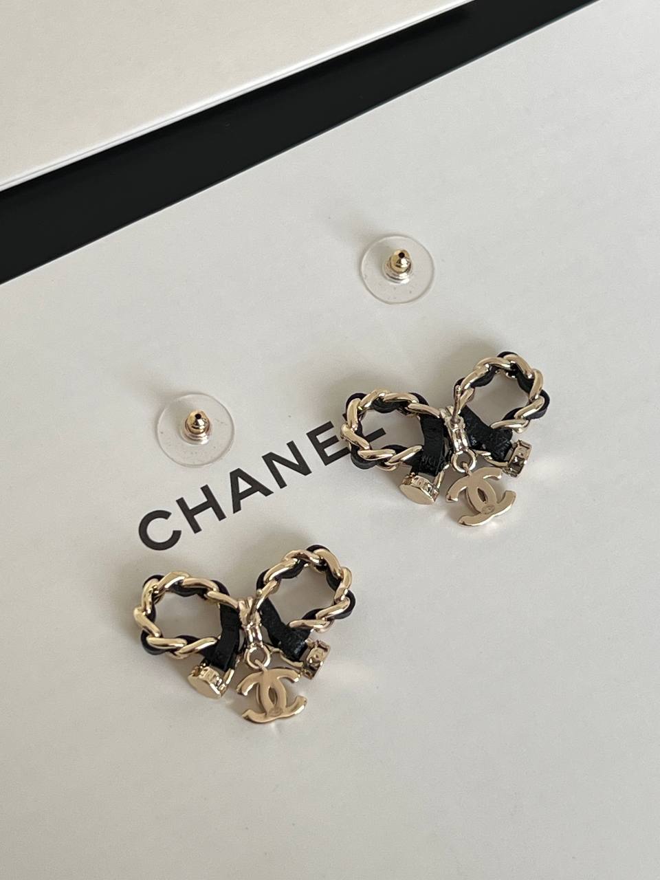 Chanel Leather Interwoven Chain Bow CC Charm Stud Earrings