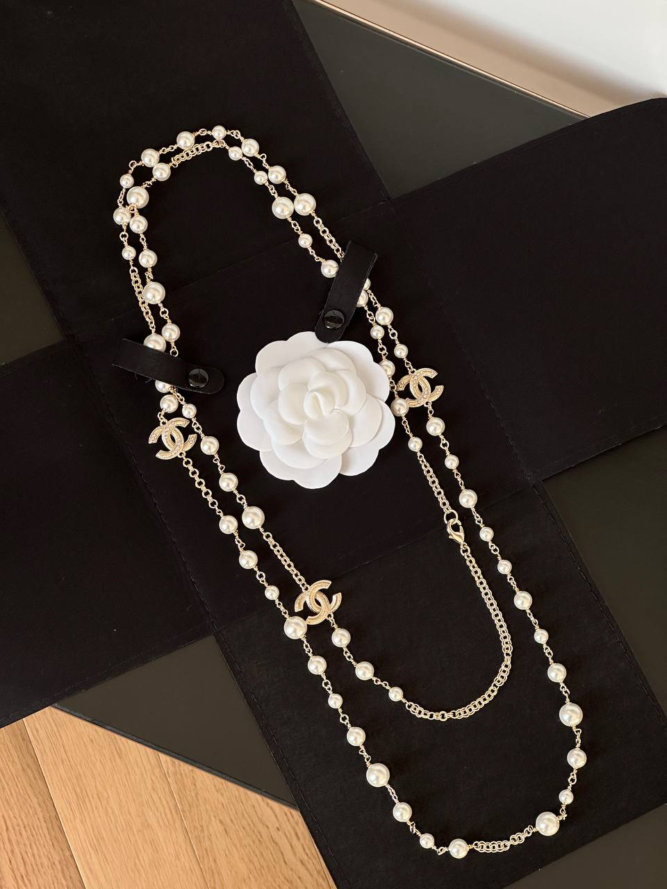 Chanel Long Necklace with Glass Pearls & CC Logos