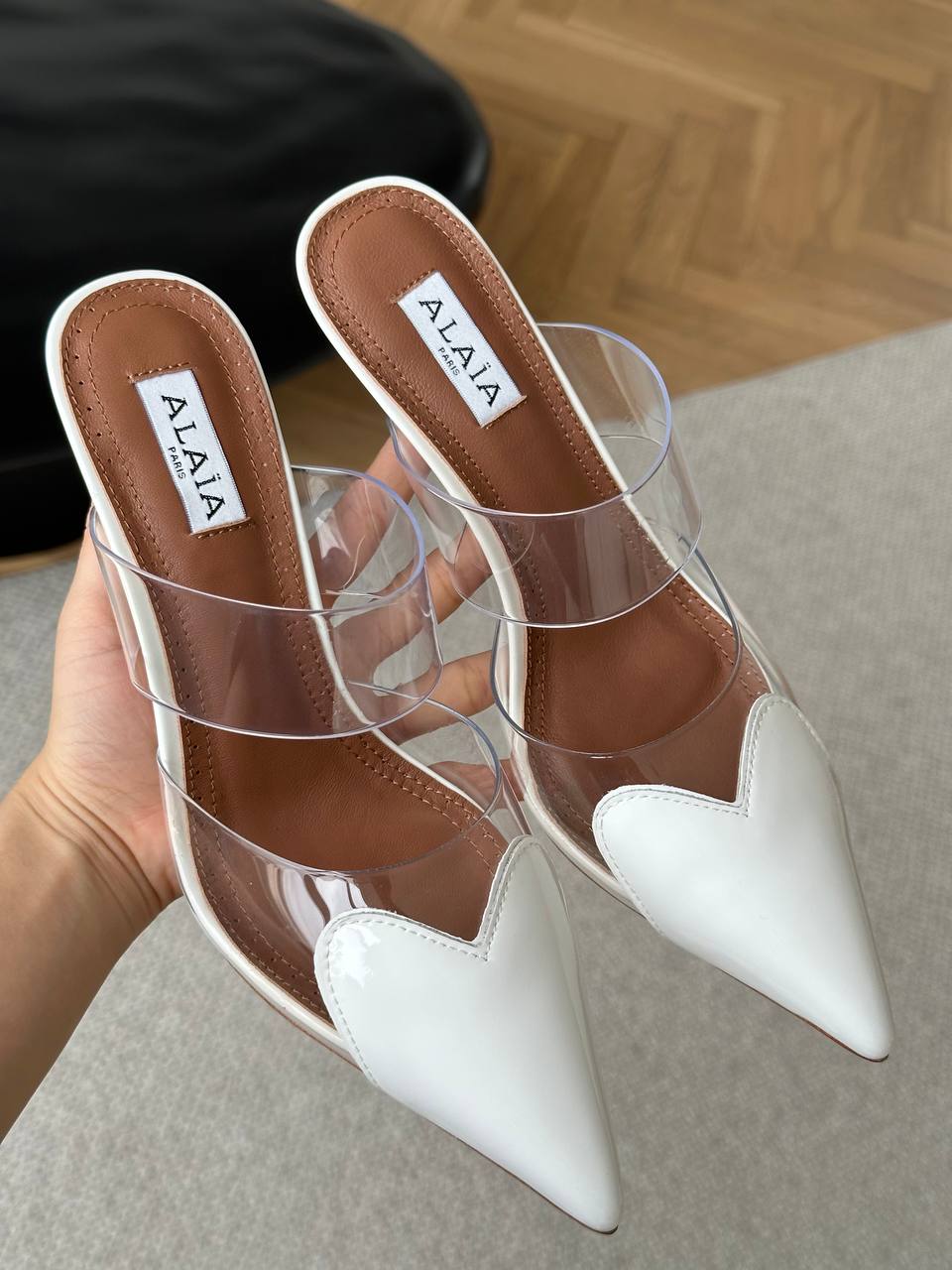 ALAÏA White Patent Leather Heart Pointed PVC Two-Strap Heel Mules