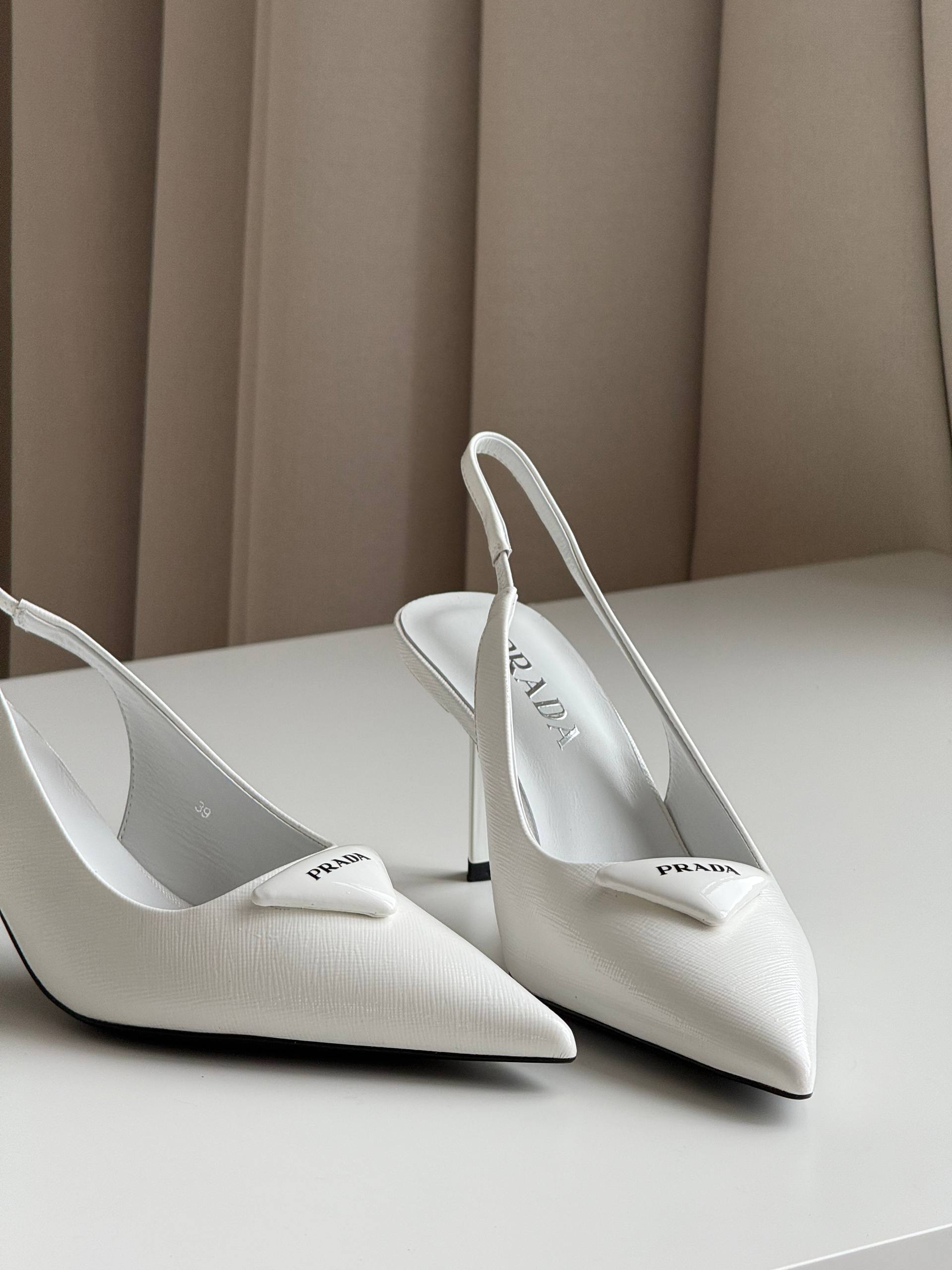 Prada Pointed-Toe Slingback Pumps with Triangle Logo