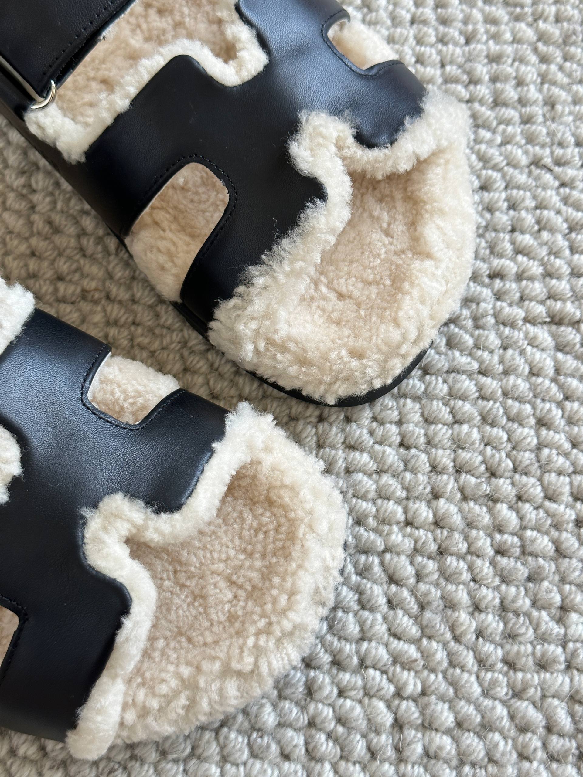 Hermès Black Calfskin & Shearling Chypre Sandals