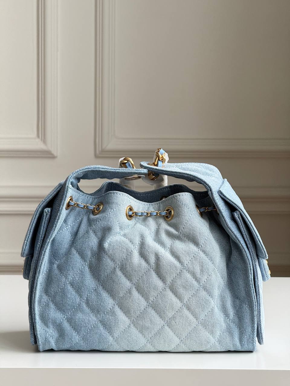 Chanel 25 Quilted Denim Drawstring Bucket Bag