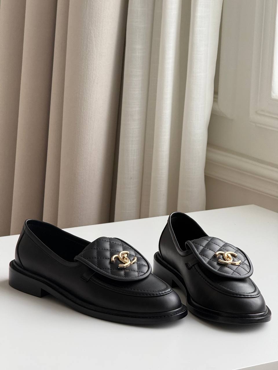 CHANEL Quilted CC Turnlock Loafers