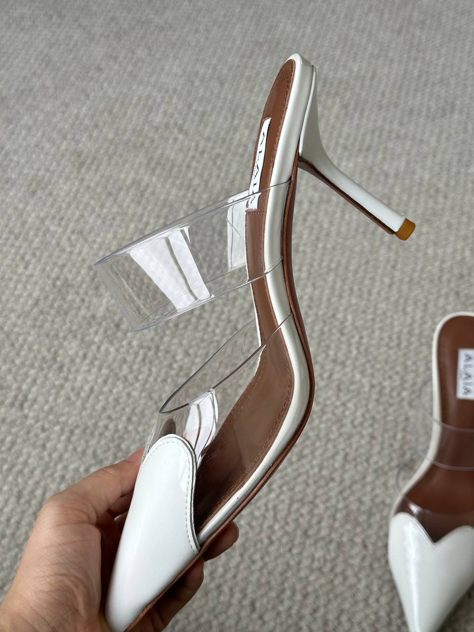 ALAÏA White Patent Leather Heart Pointed PVC Two-Strap Heel Mules