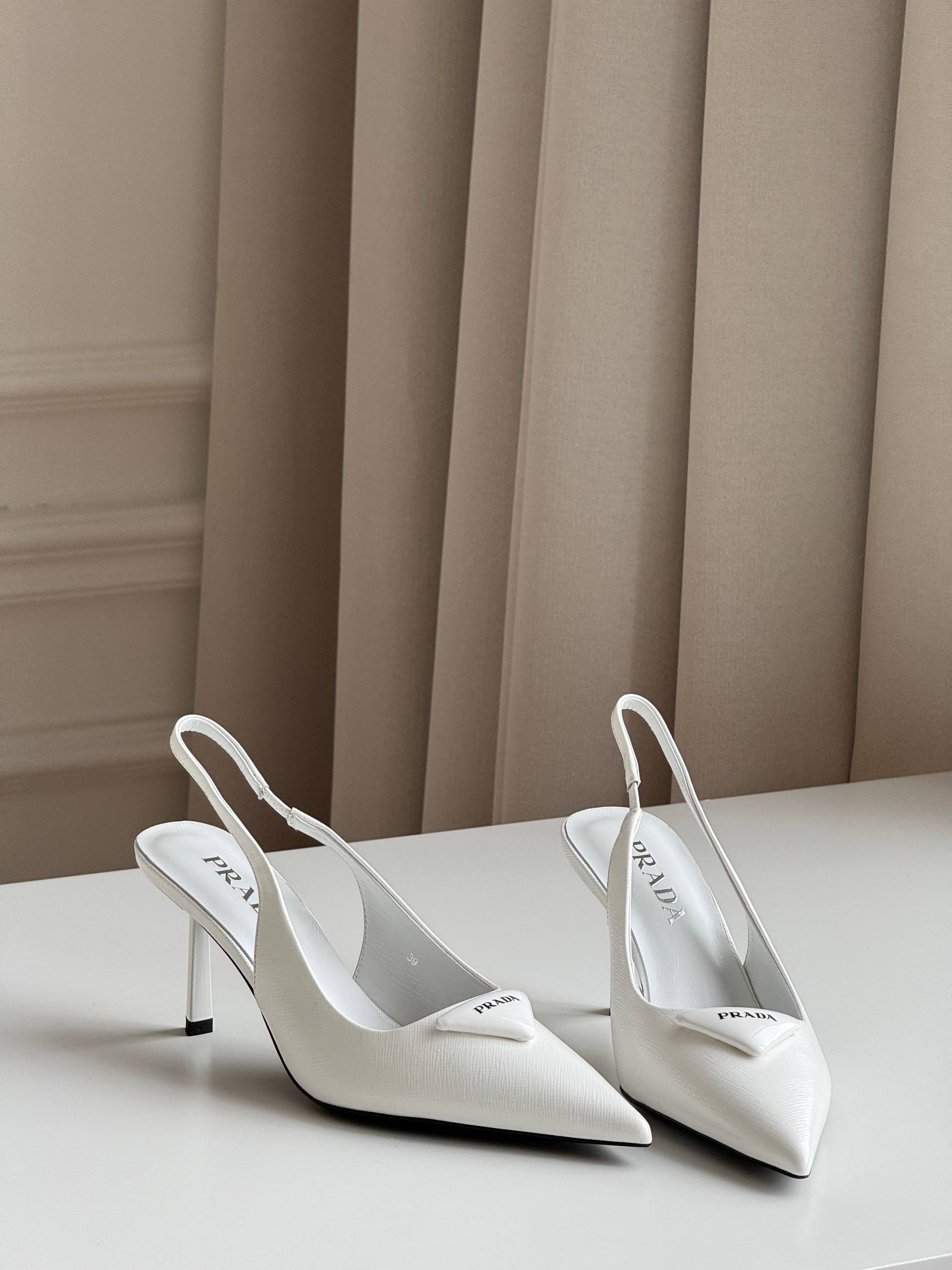 Prada Pointed-Toe Slingback Pumps with Triangle Logo
