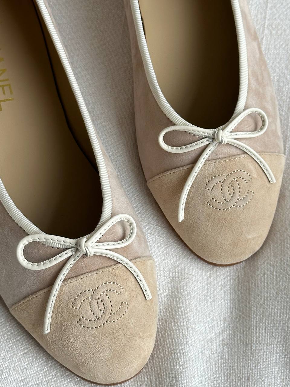Chanel Nude Suede Two-Tone Bow CC Embossed Ballet Flats