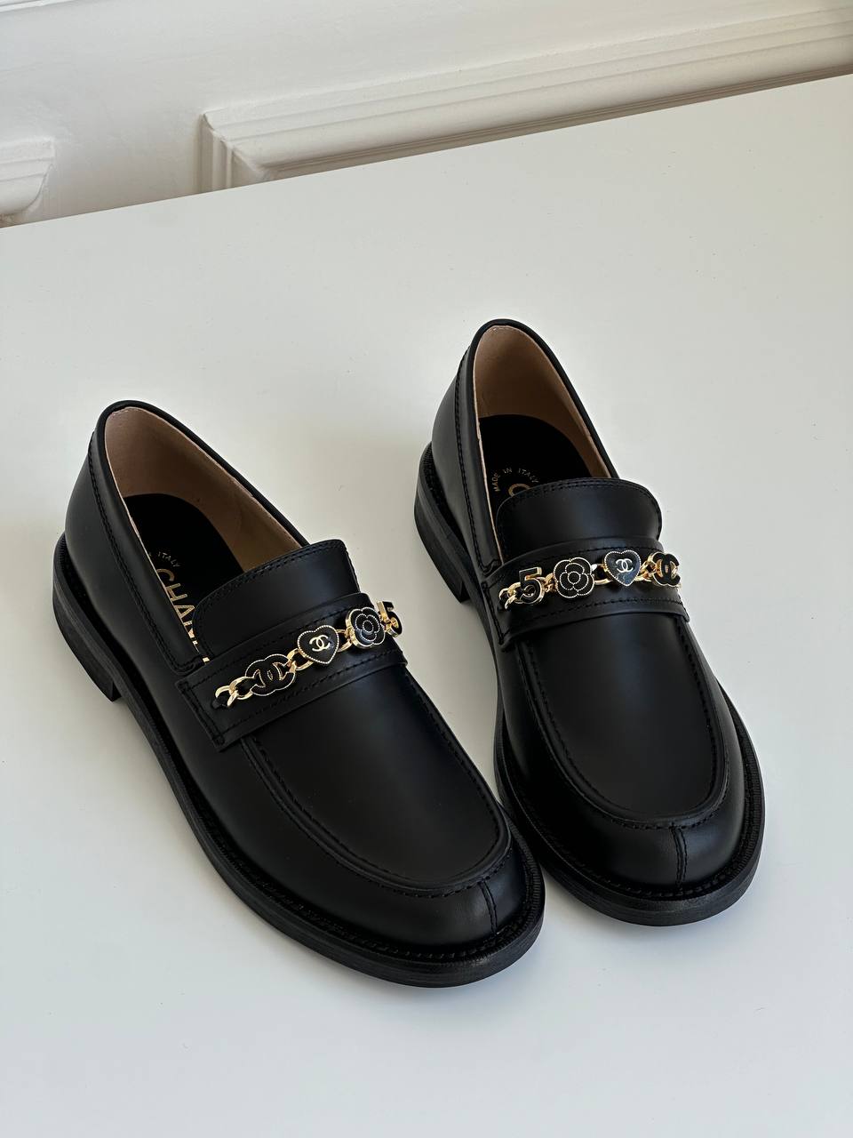 Chanel Black Smooth Calfskin Heart Camellia Interlocking CC Metal Chain Low Heel Loafers