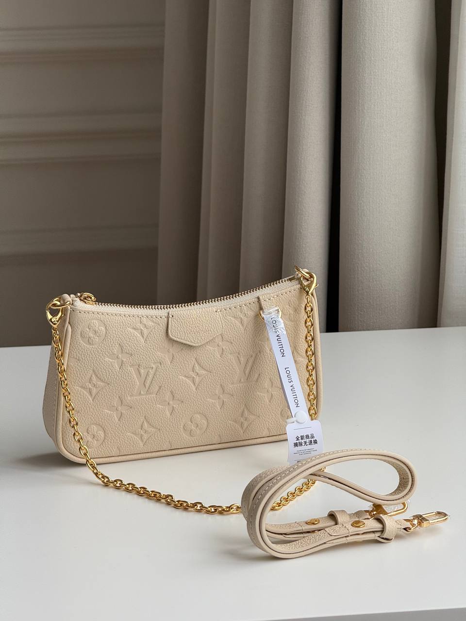 Louis Vuitton Easy Pouch On Strap in Monogram Empreinte Leather
