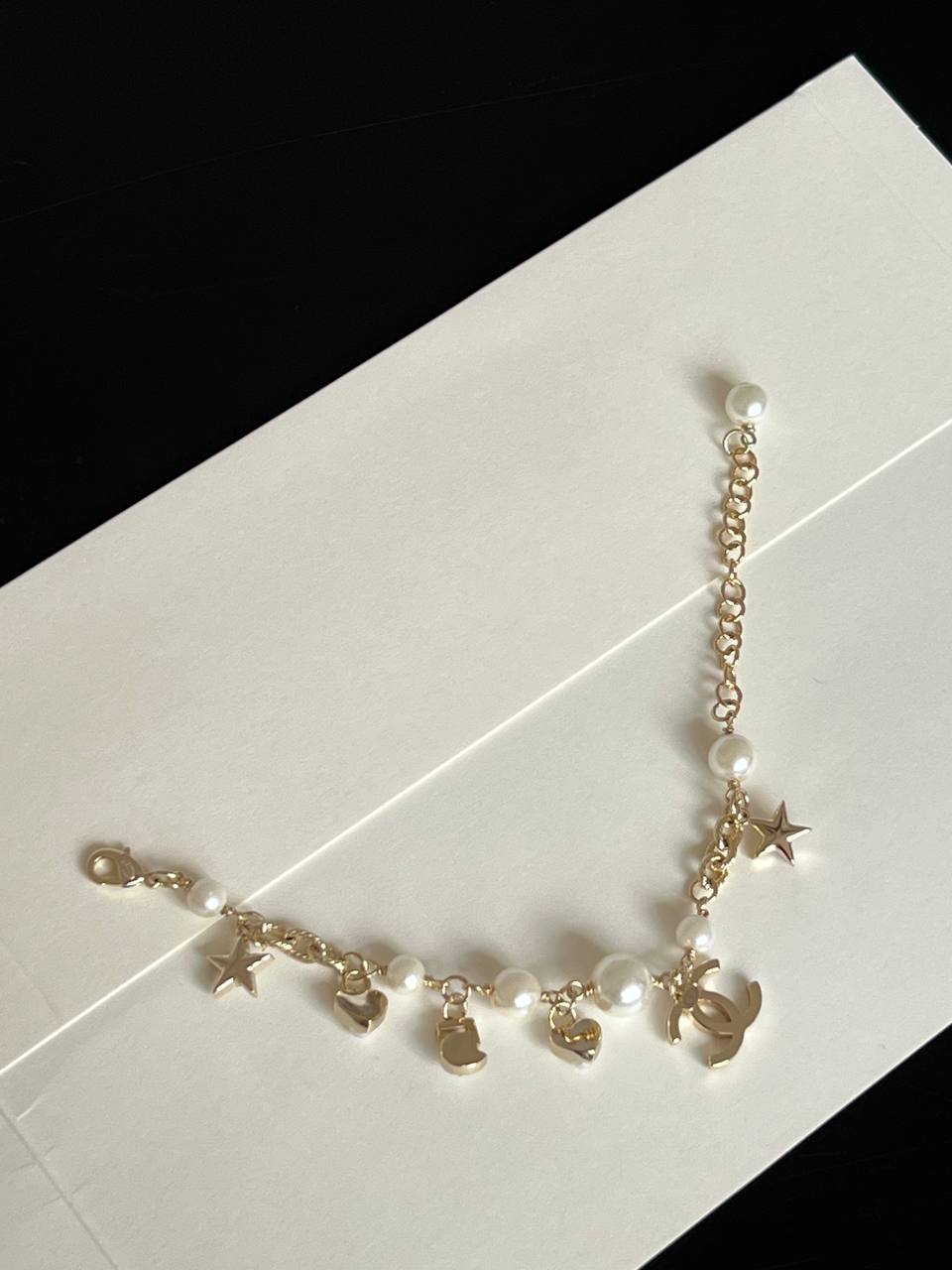 Chanel Light Gold Chain Bracelet With Crystal CC, Pearl, Star, Heart & No.5 Charms Adjustable