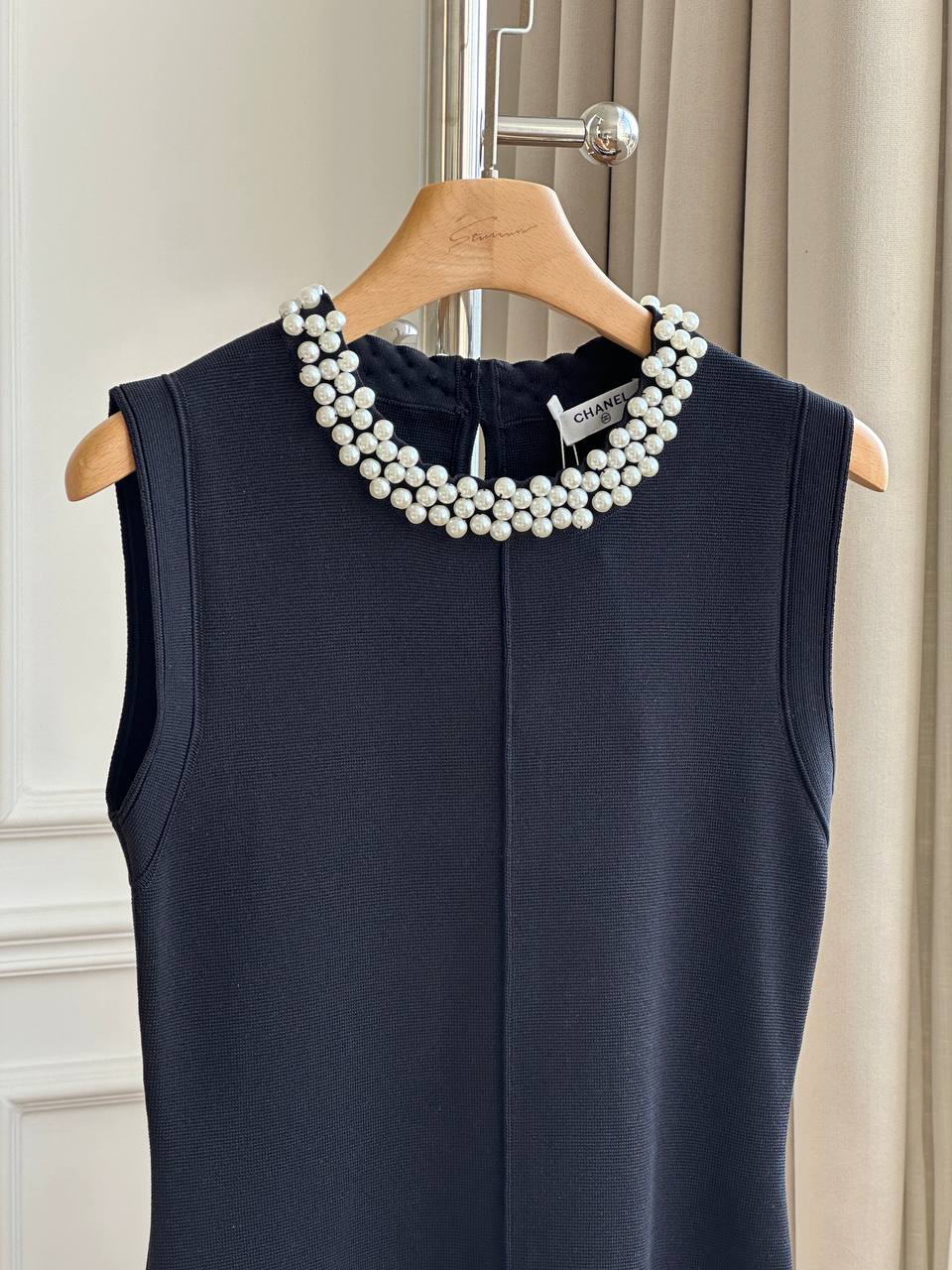 CHANEL Sleeveless Knit Dress with Pearl Neckline and Ruffled Hem