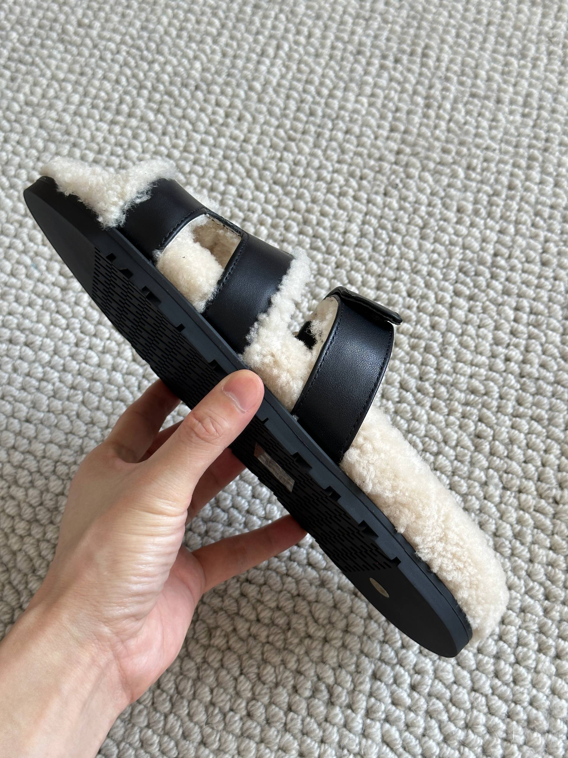 Hermès Black Calfskin & Shearling Chypre Sandals