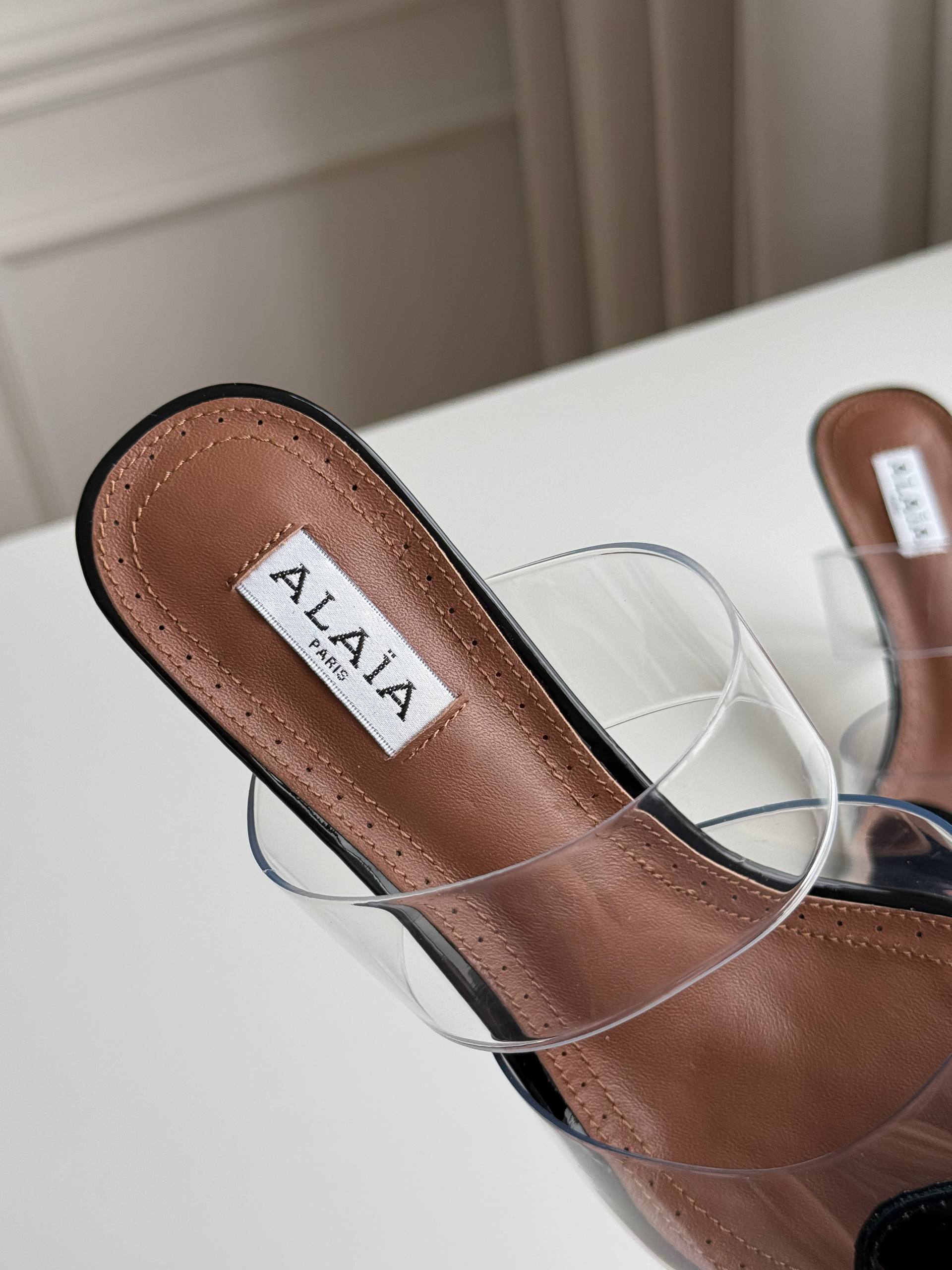 ALAÏA Coeur PVC & Patent Leather Pointed-Toe Mules