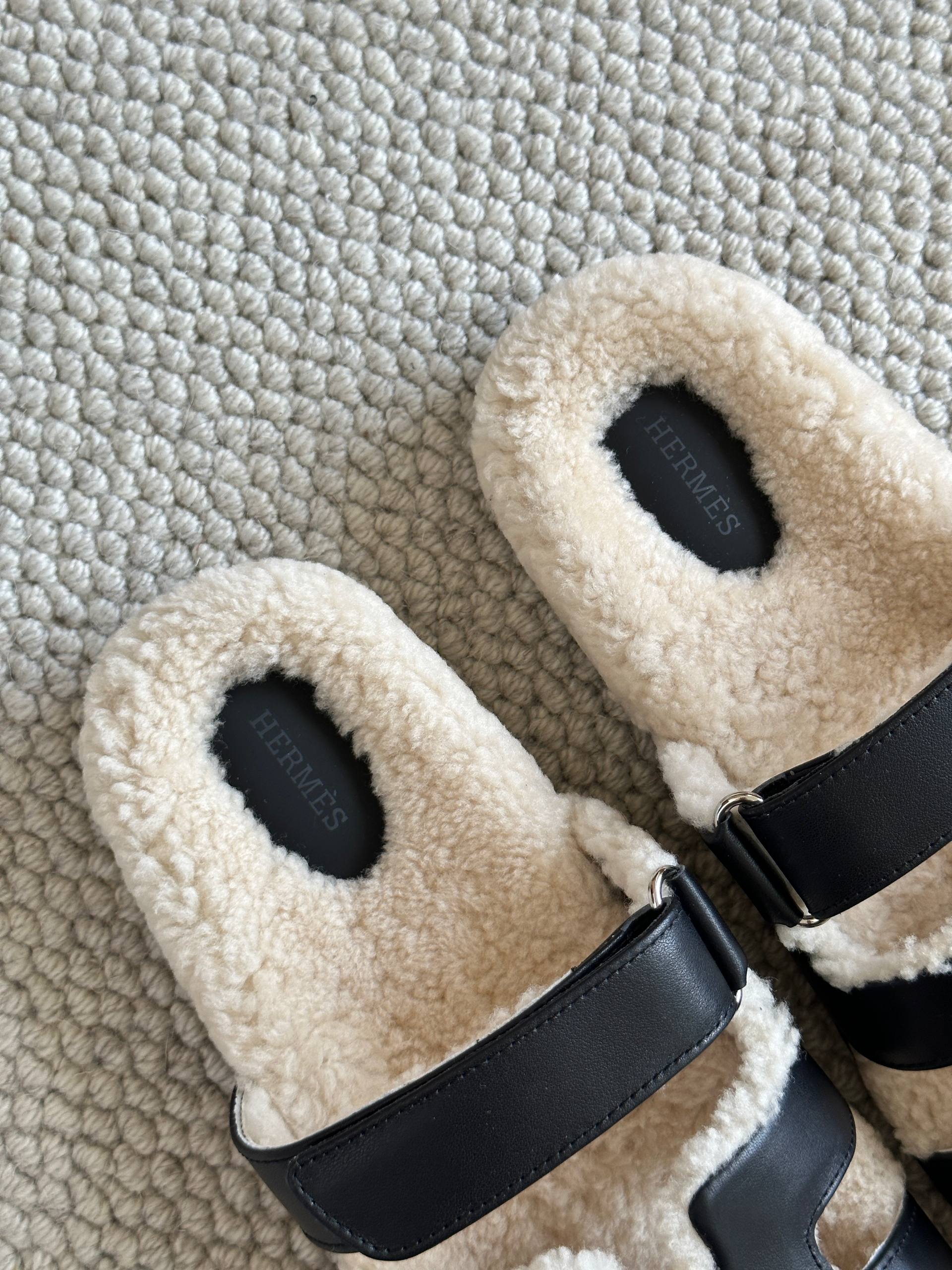 Hermès Black Calfskin & Shearling Chypre Sandals