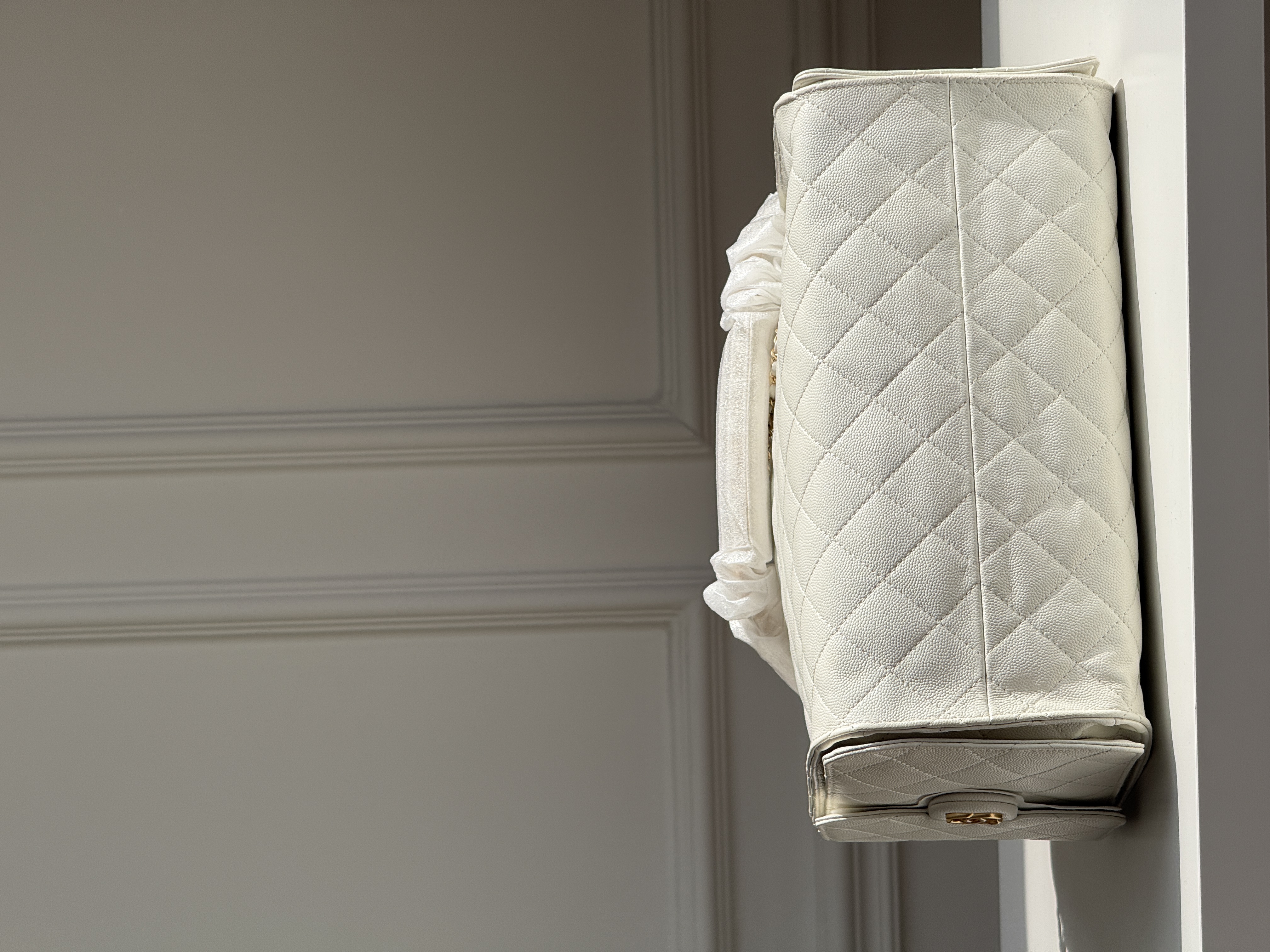 CHANEL Quilted Drawstring Bucket Bag in Milky White