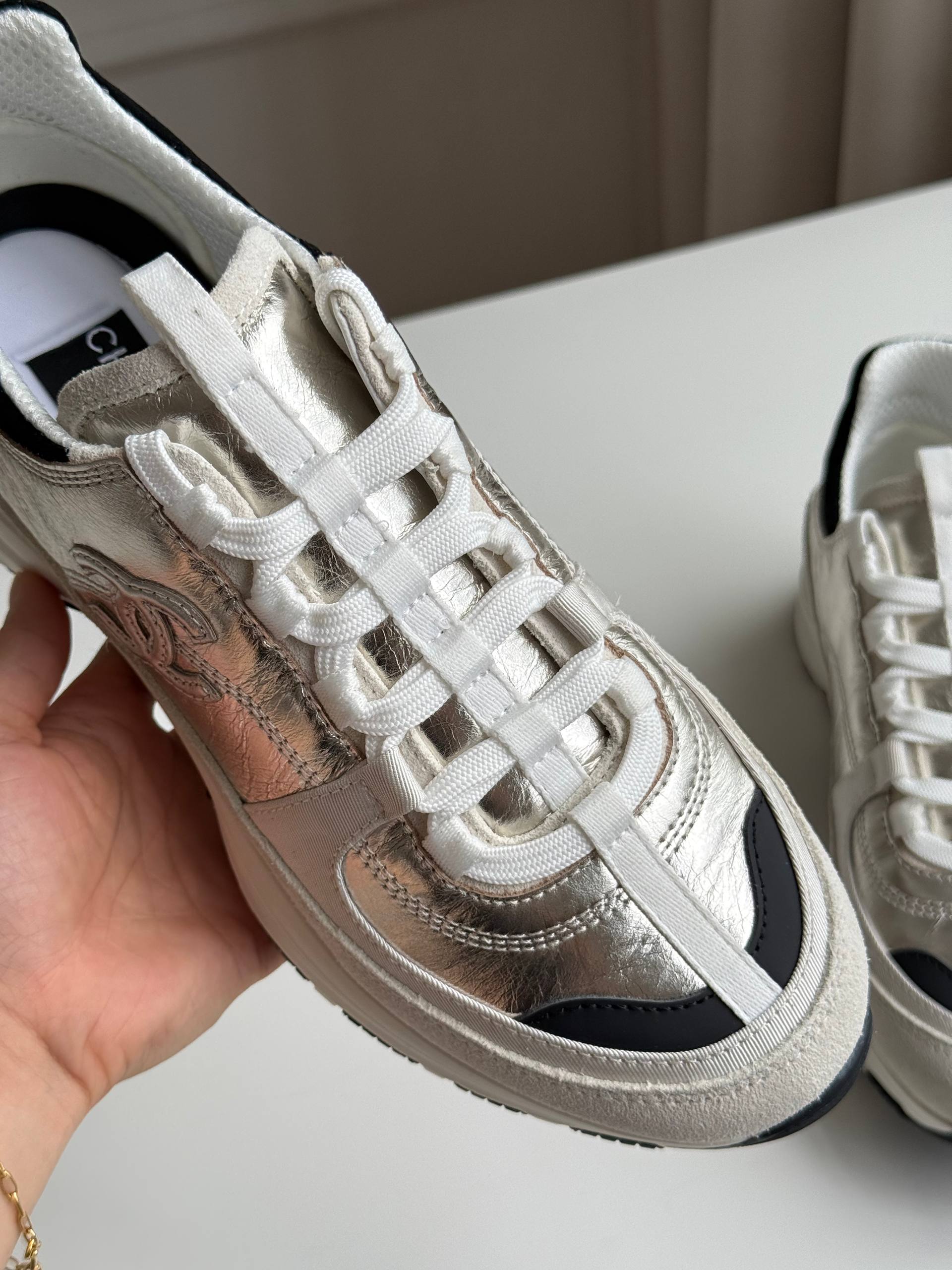 Chanel Metallic CC Logo Low-Top Sneakers