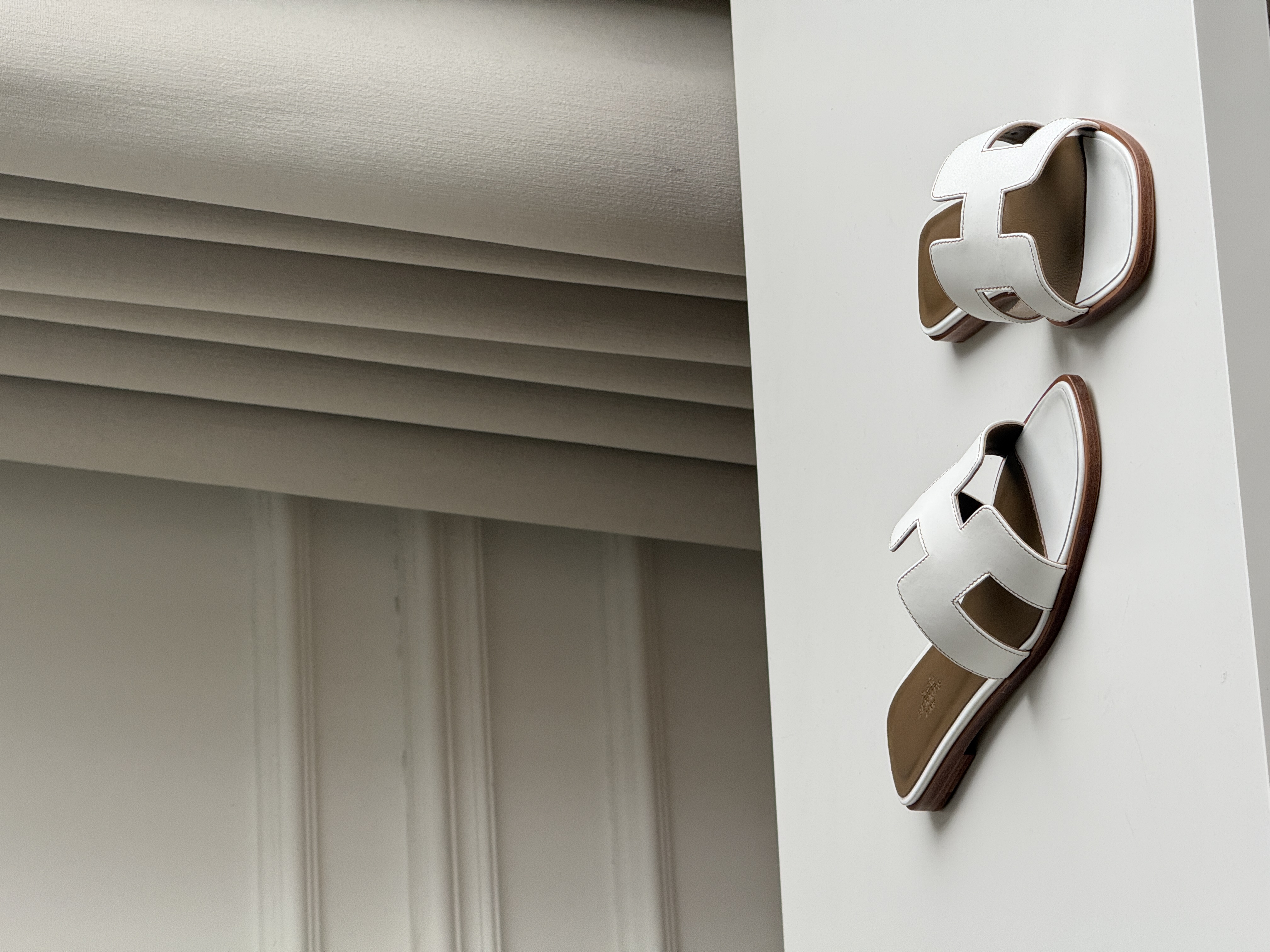 Hermès Oran Sandals in White Calfskin