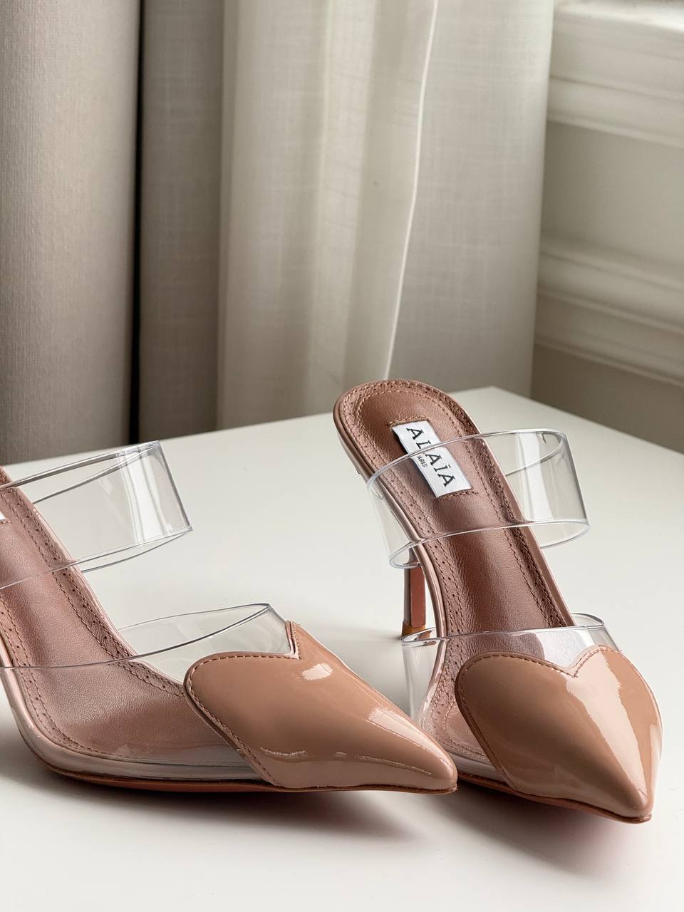ALAÏA Heart PVC & Patent Leather Pointed-Toe Mules Nude