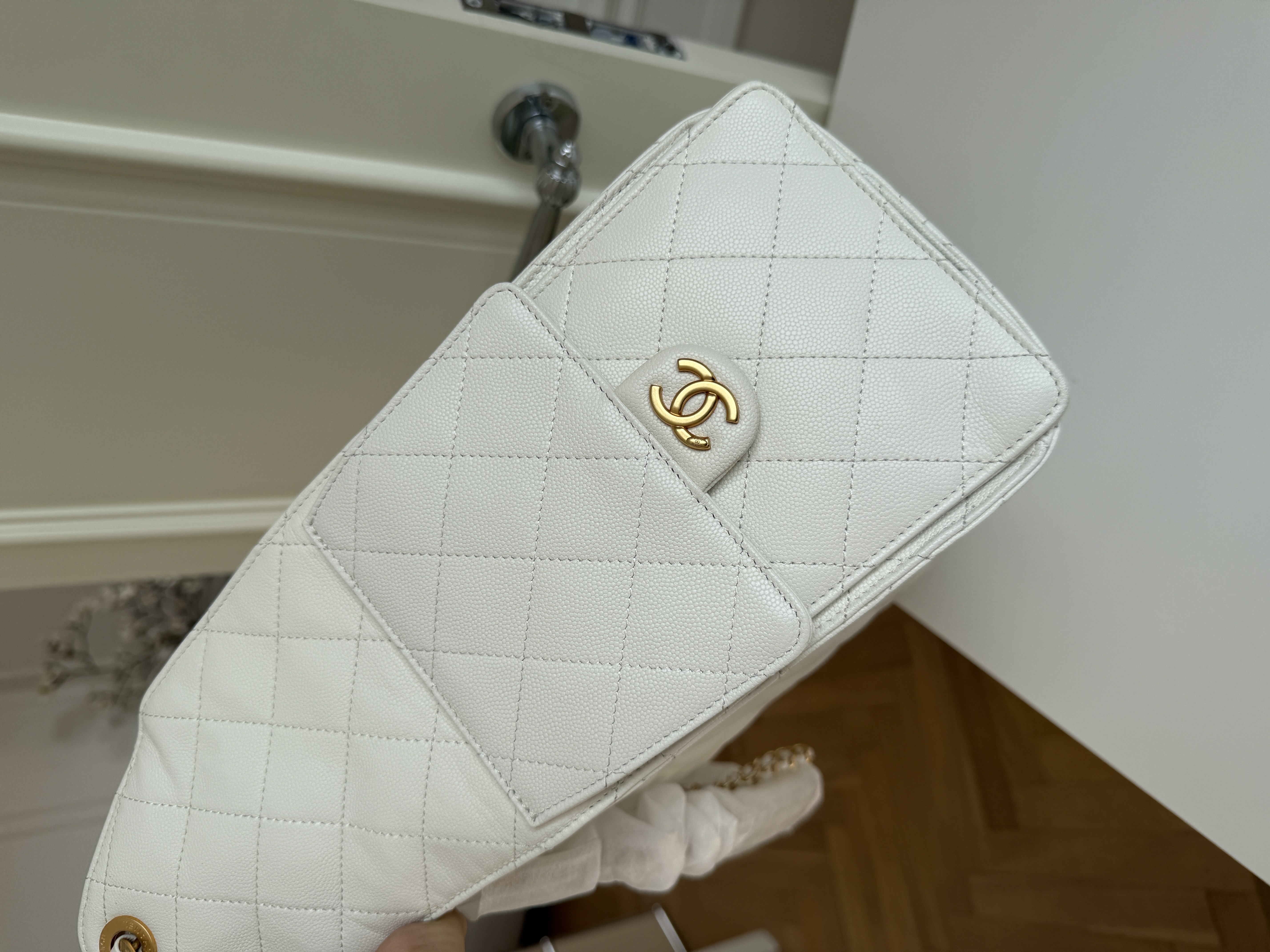 CHANEL Quilted Drawstring Bucket Bag in Milky White