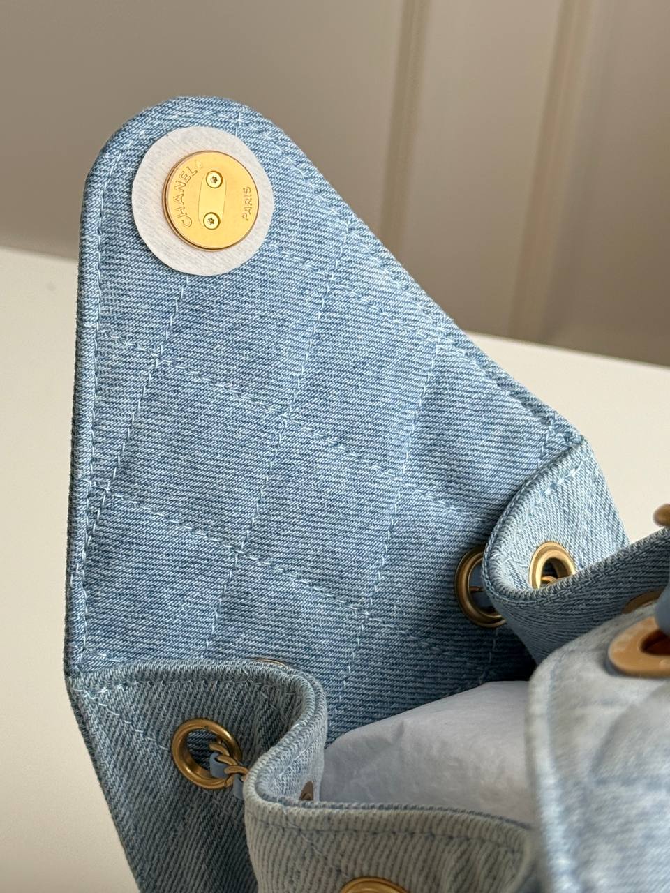 Chanel 25 Quilted Denim Drawstring Bucket Bag