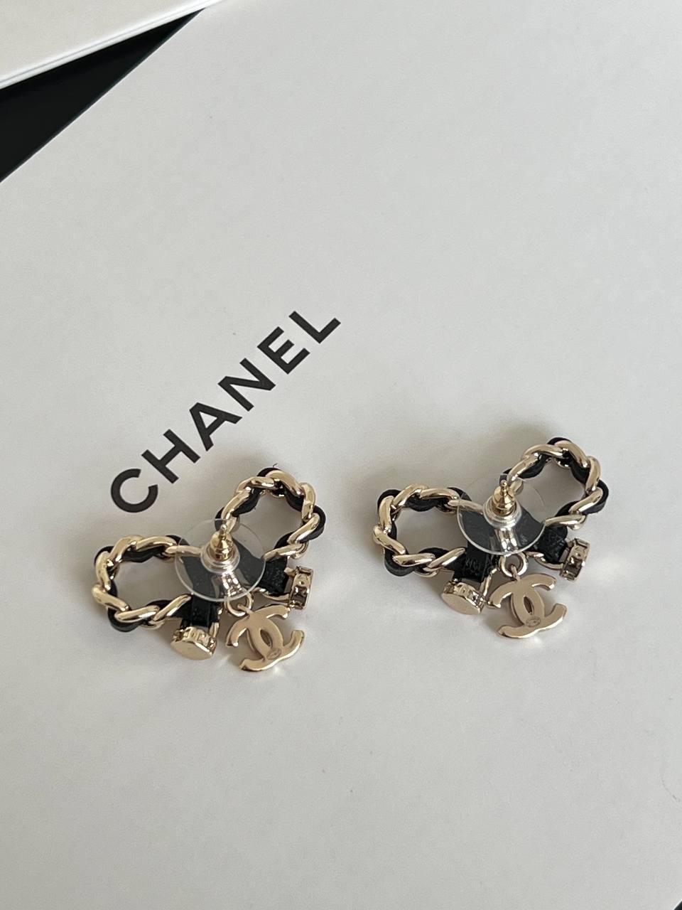 Chanel Leather Interwoven Chain Bow CC Charm Stud Earrings