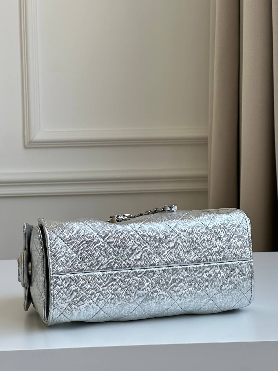 CHANEL Metallic Caviar Quilted Drawstring Bucket Bag