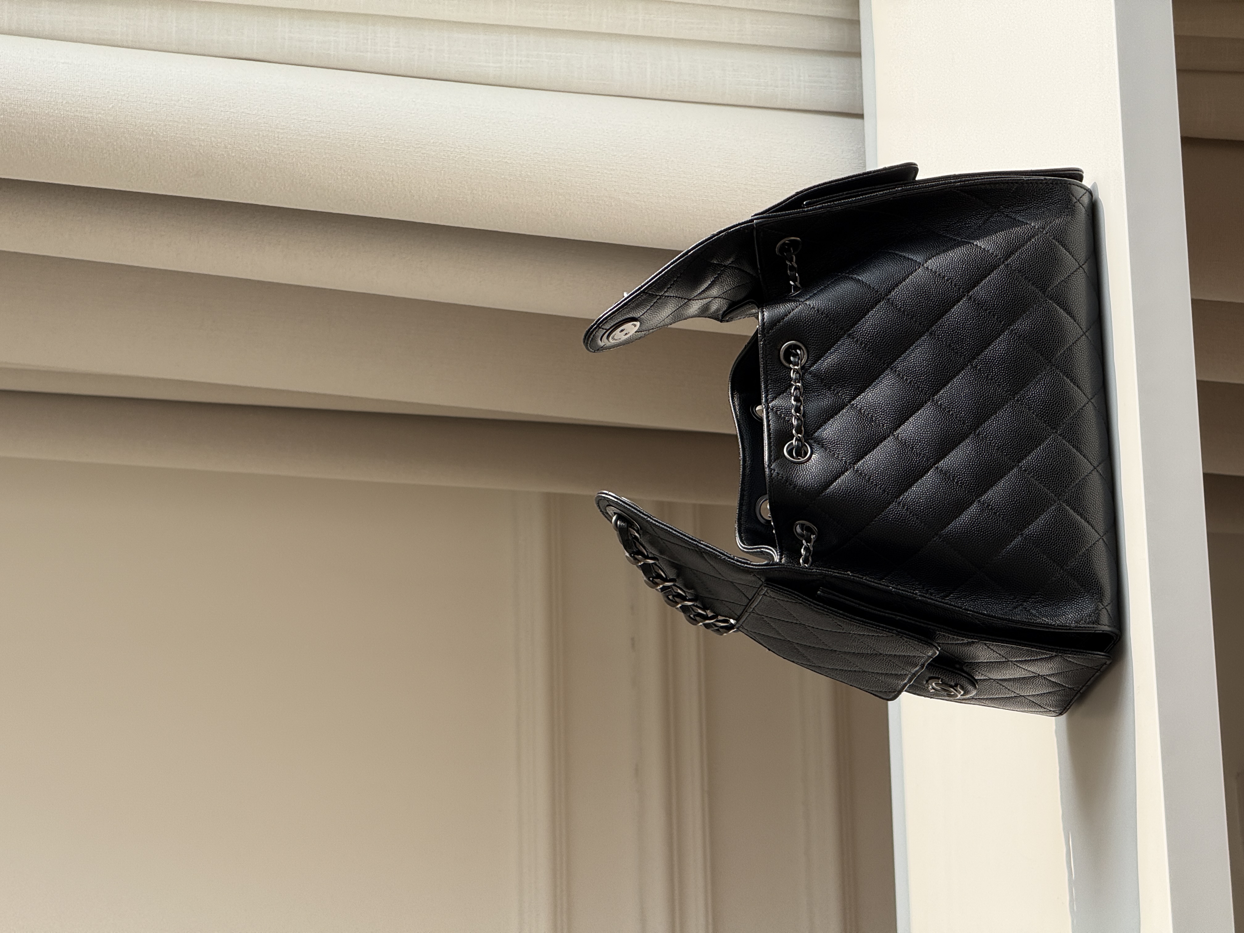 Chanel Caviar Quilted Drawstring Chain Bucket Backpack