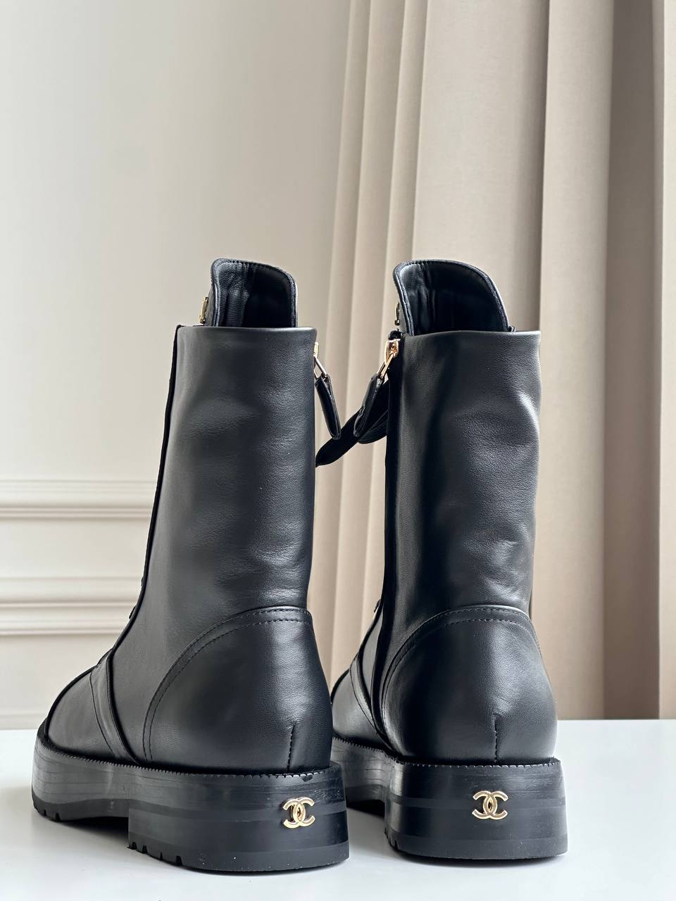 Chanel CC Embossed Leather Lace-Up Combat Boots