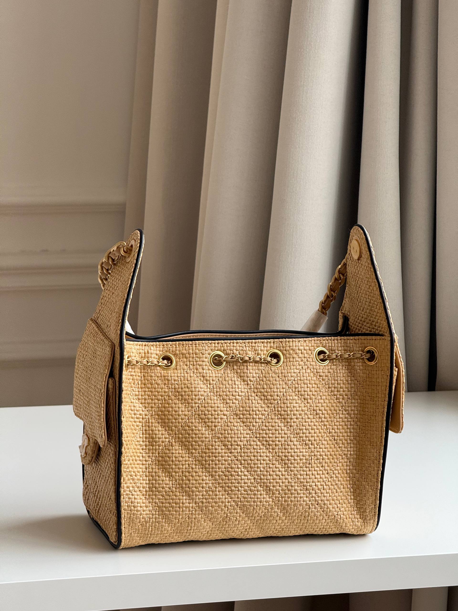 Chanel Quilted Raffia Drawstring Bucket Bag