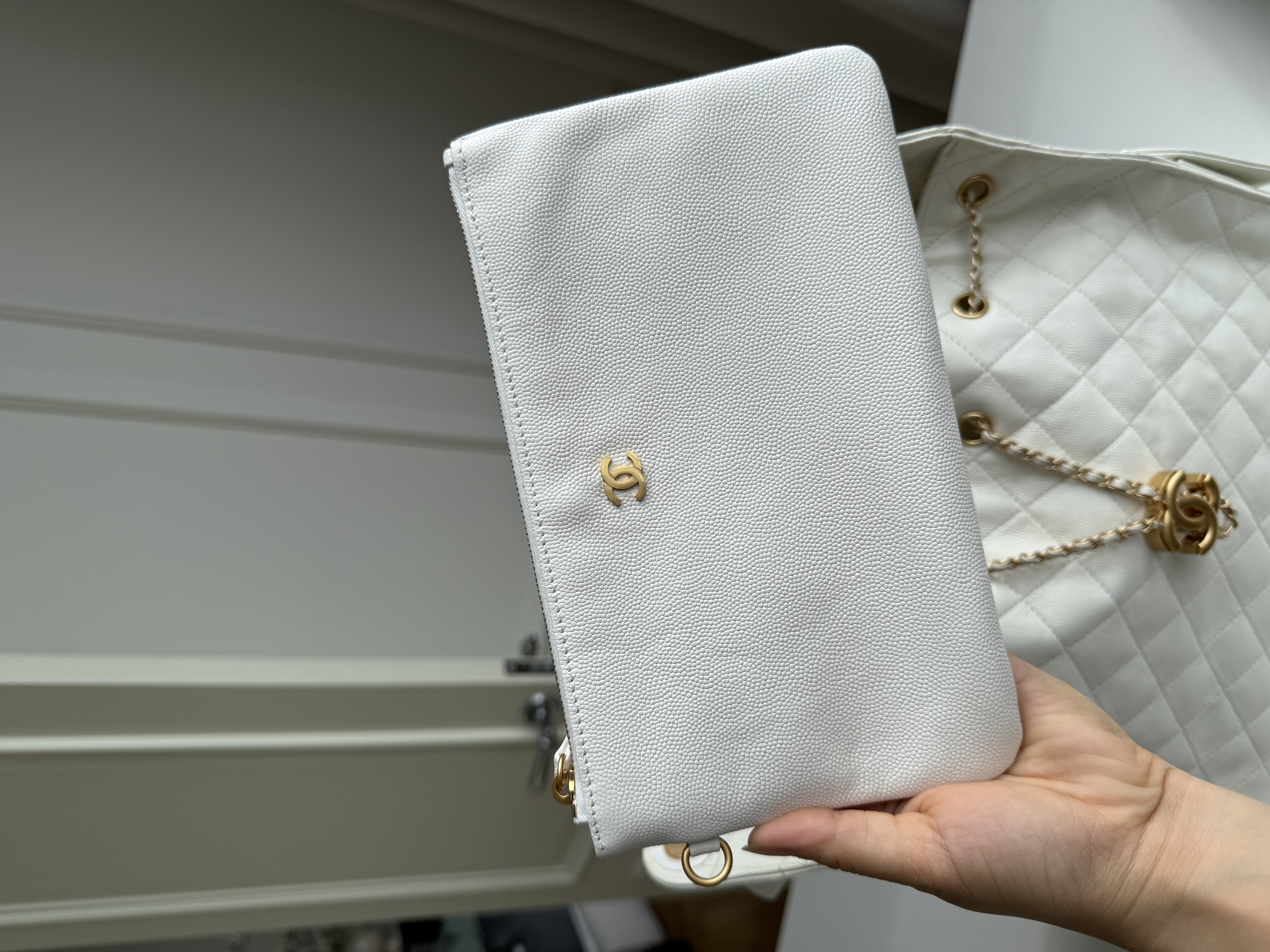 CHANEL Quilted Drawstring Bucket Bag in Milky White